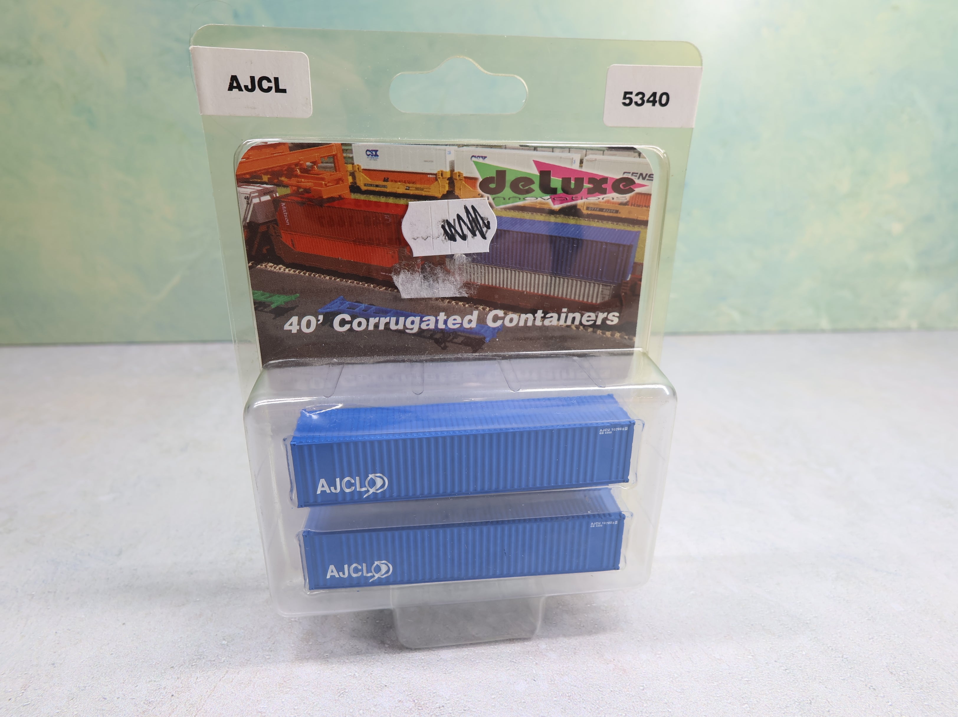Deluxe 5340 N Scale 40' Corrugated Containers AJCL (2 pcs)