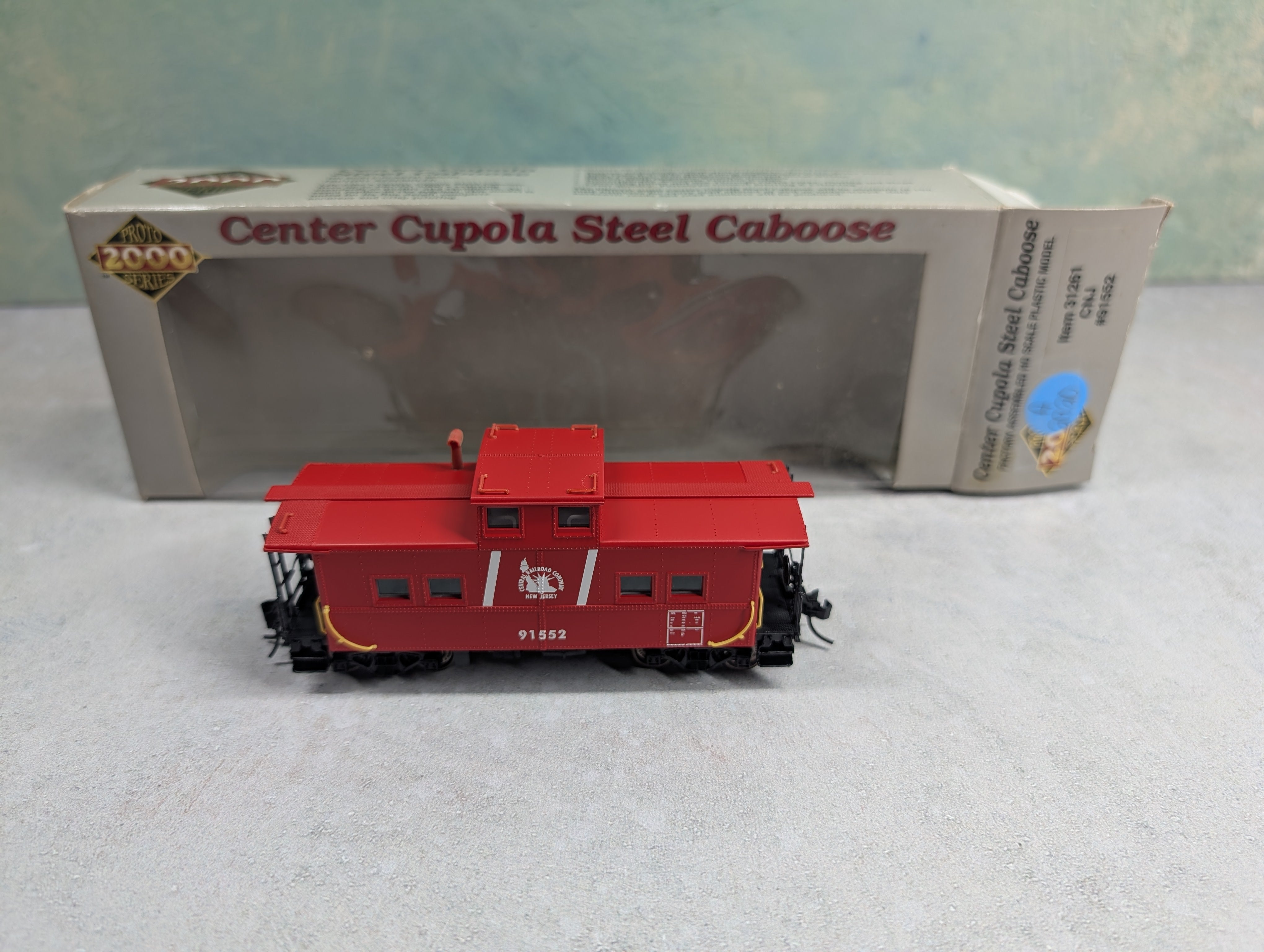 USED Life-Like 31261 HO Scale Center Cupola Steel Caboose, Proto 2000 Jersey Central CNJ #91552