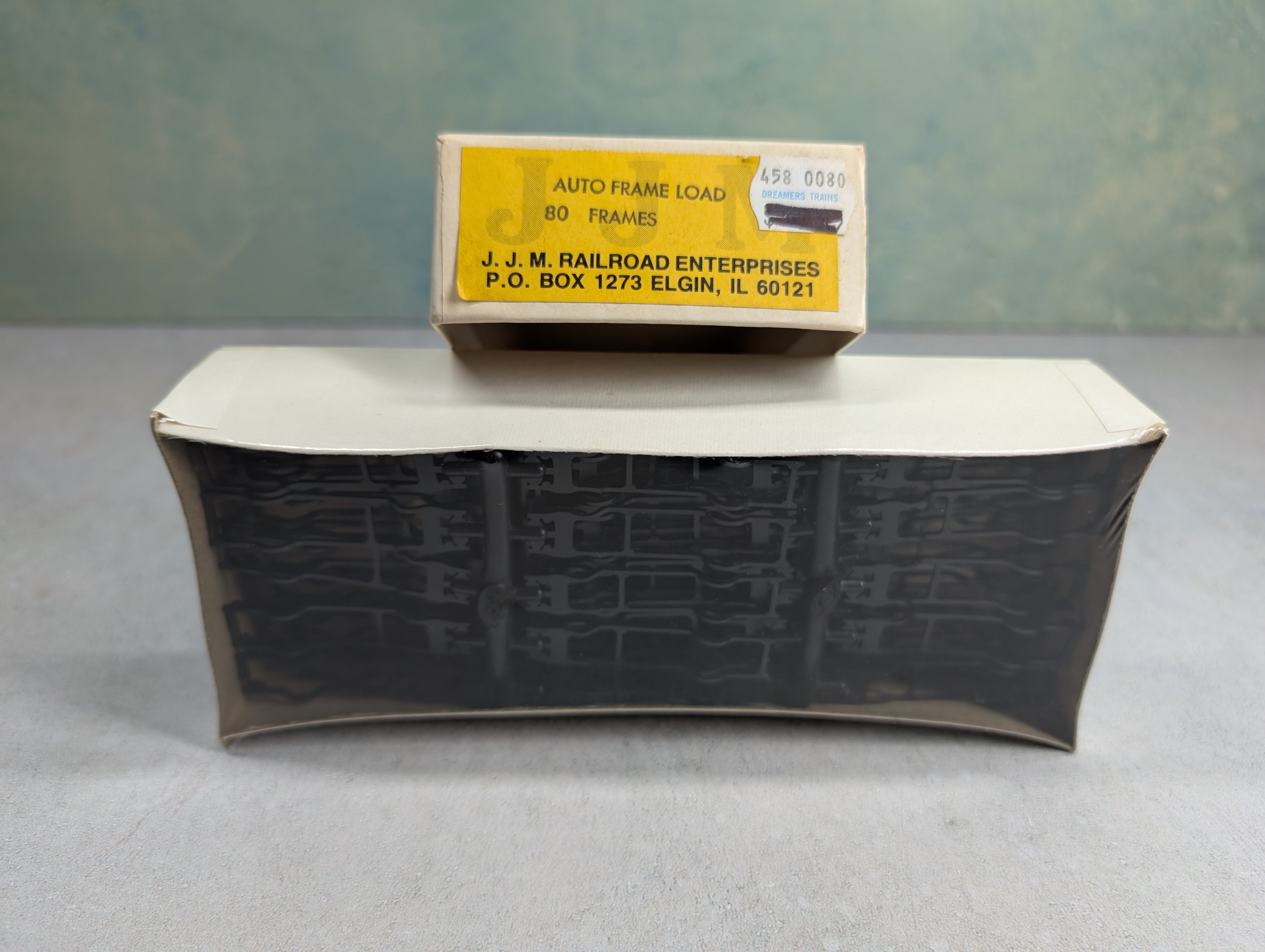 USED JJM Railroad Enterprises HO Scale Sealed Pack of Auto Frame Loads (80 pcs)