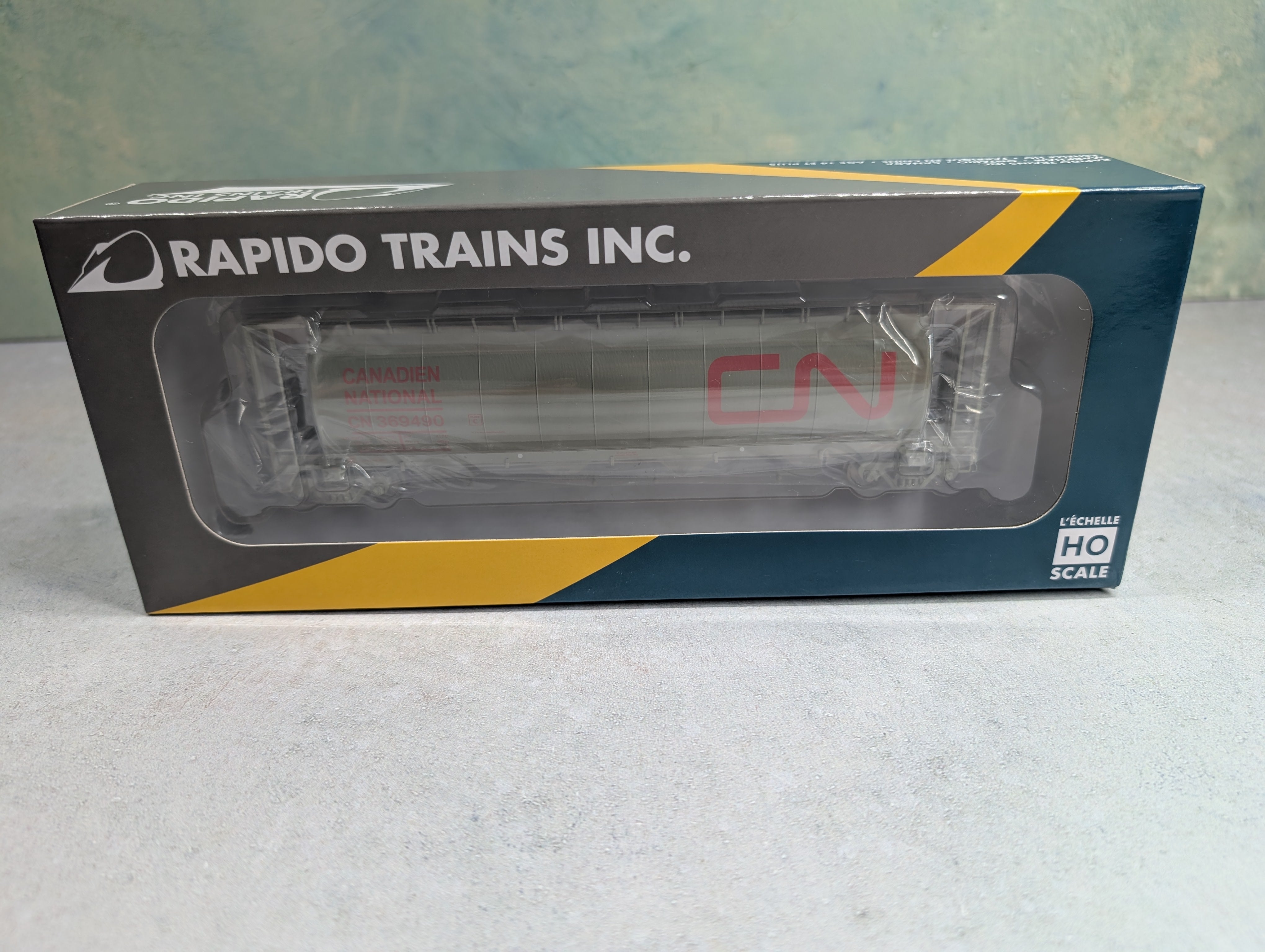 Rapido 127023A HO Scale 3800 CU FT Hopper Canadian National CN #369490 Wet Noodle (Delivery)