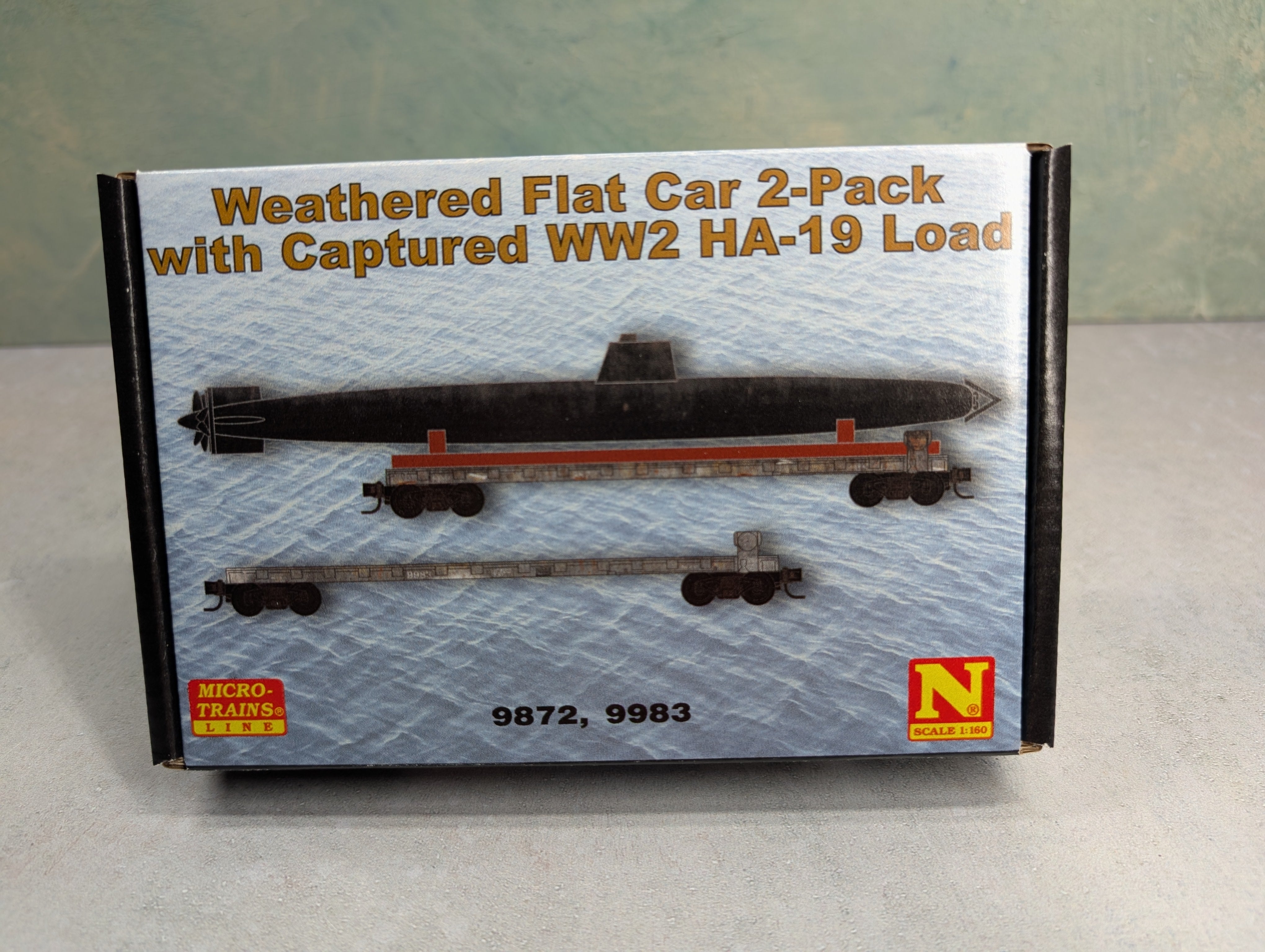 Micro-Trains 98302256 N Scale Weathered Flat Car 2-Pack w/ Captured WW2 HA-19 Load #9872 & 9983