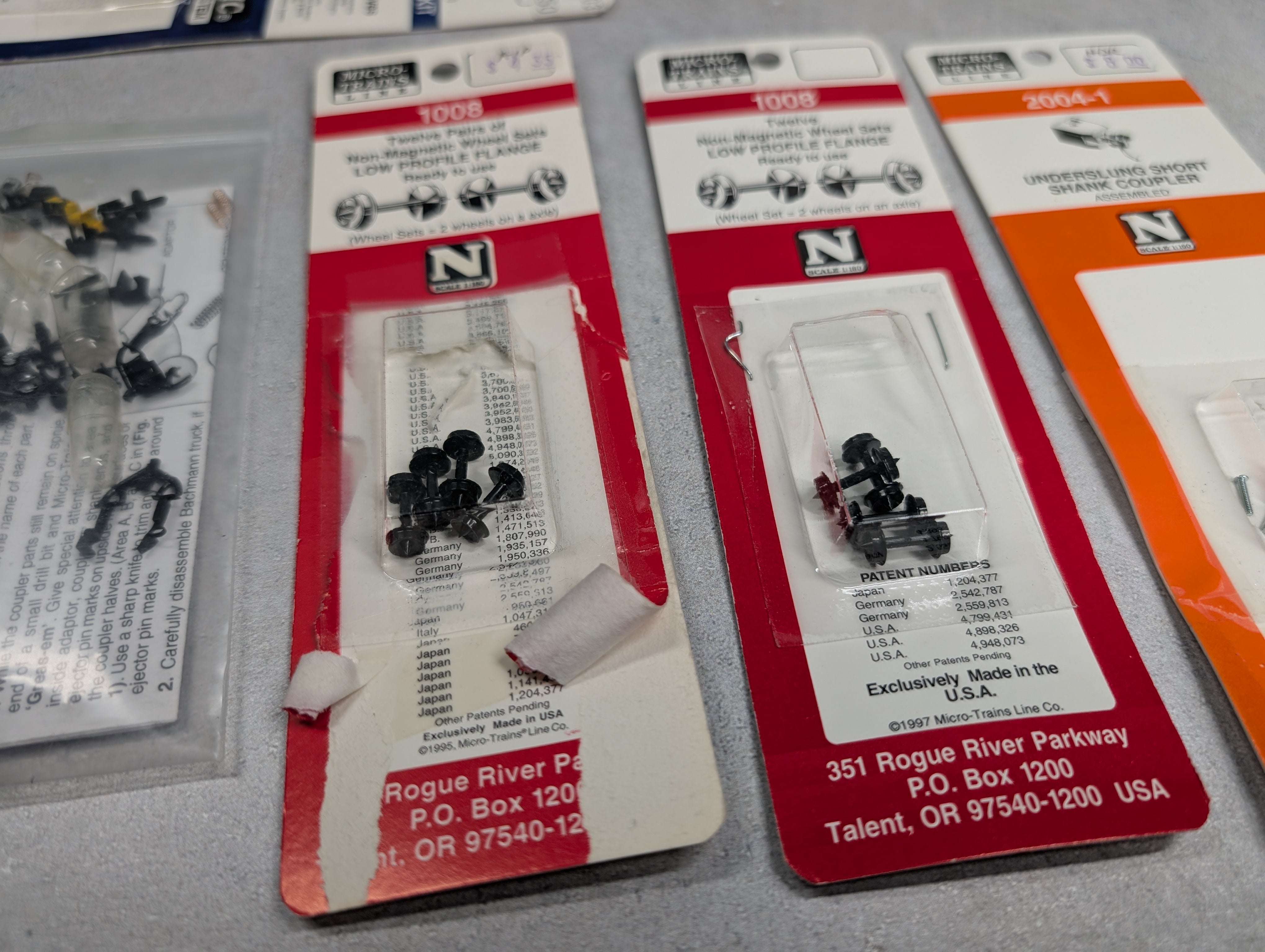 USED Micro-Trains N Scale Lot of Opened Packs of Couplers & Wheels