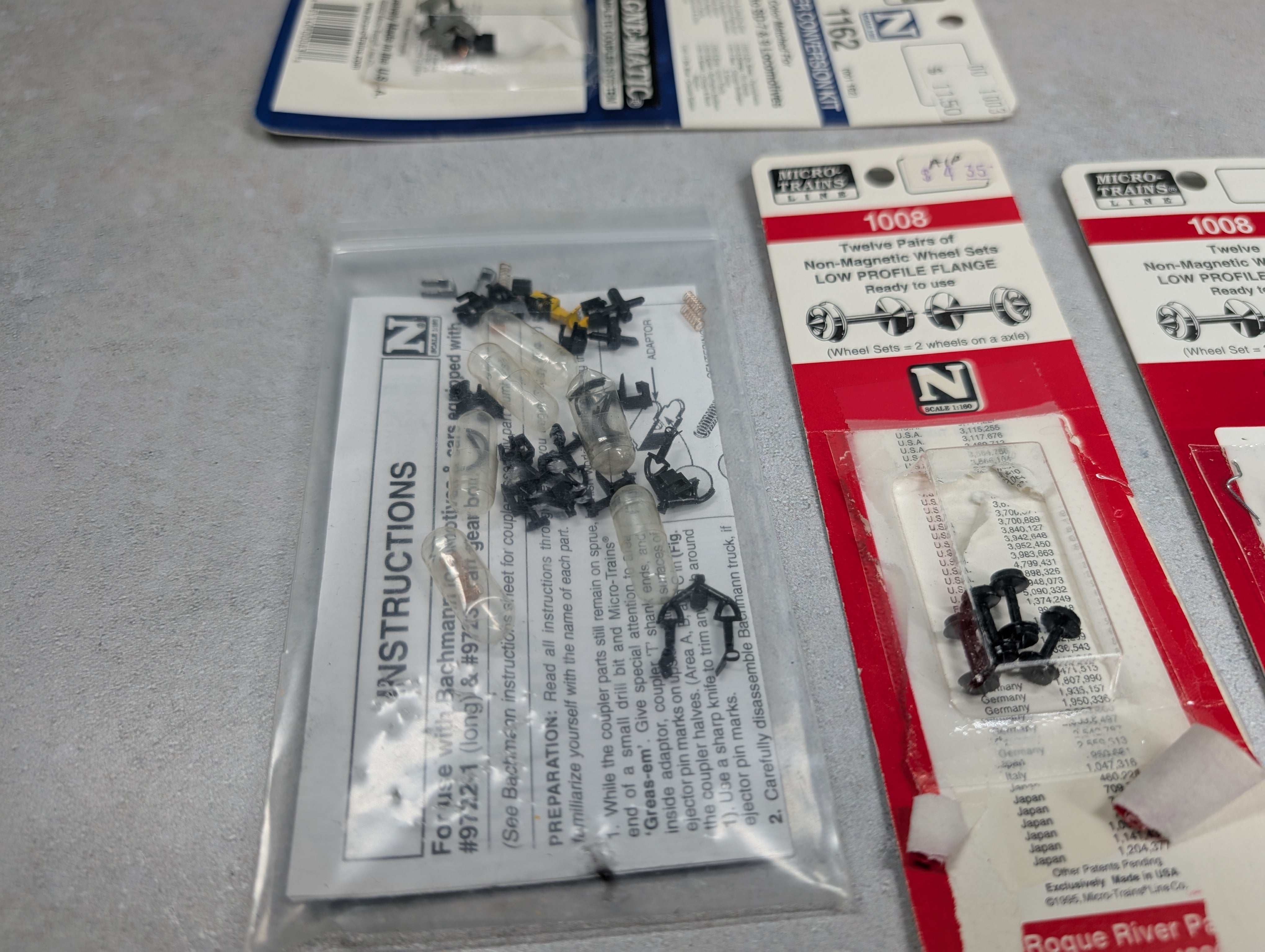 USED Micro-Trains N Scale Lot of Opened Packs of Couplers & Wheels