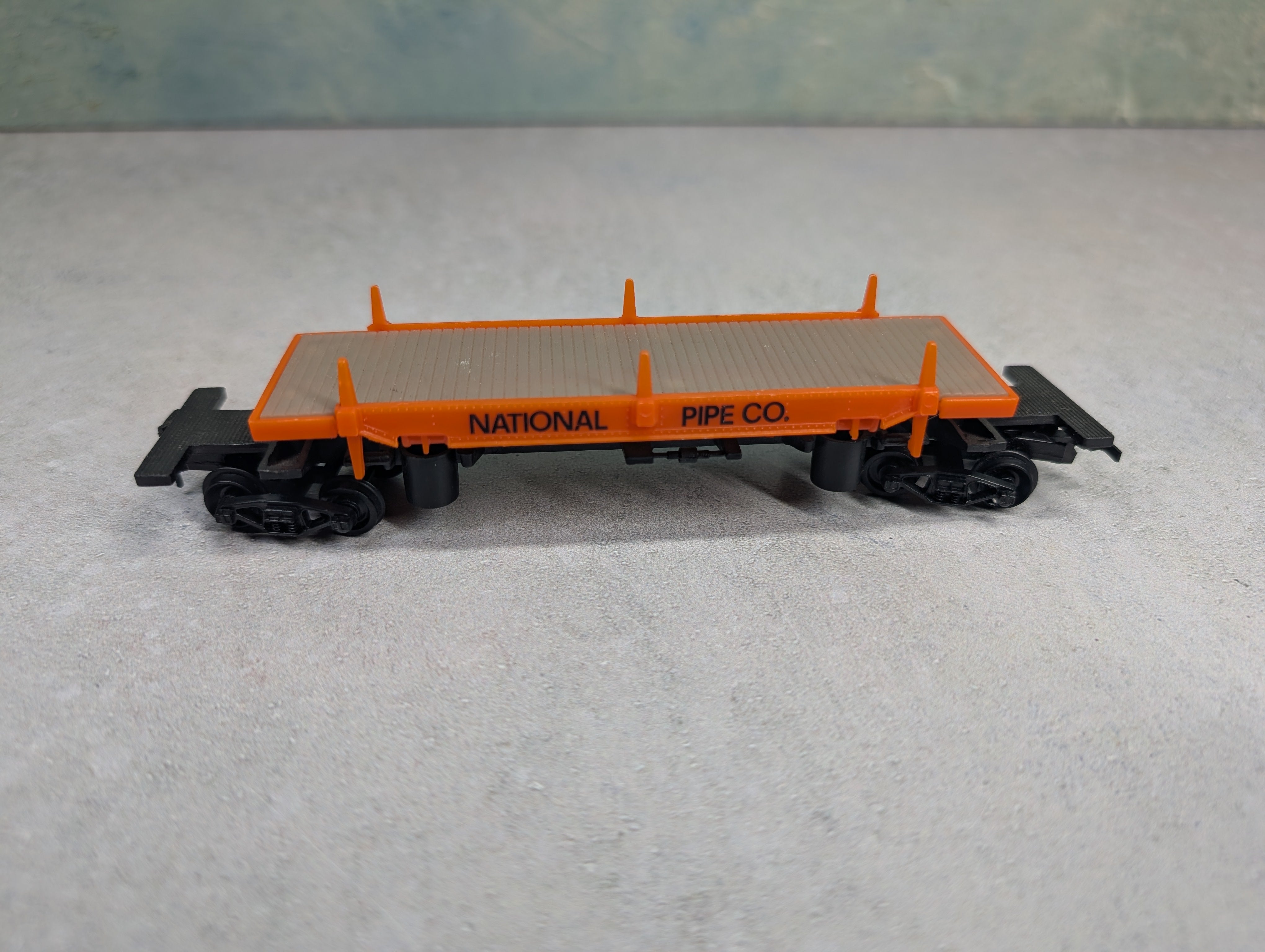 USED Life-Like HO Scale Pipe Dumping Car National Pipe Co