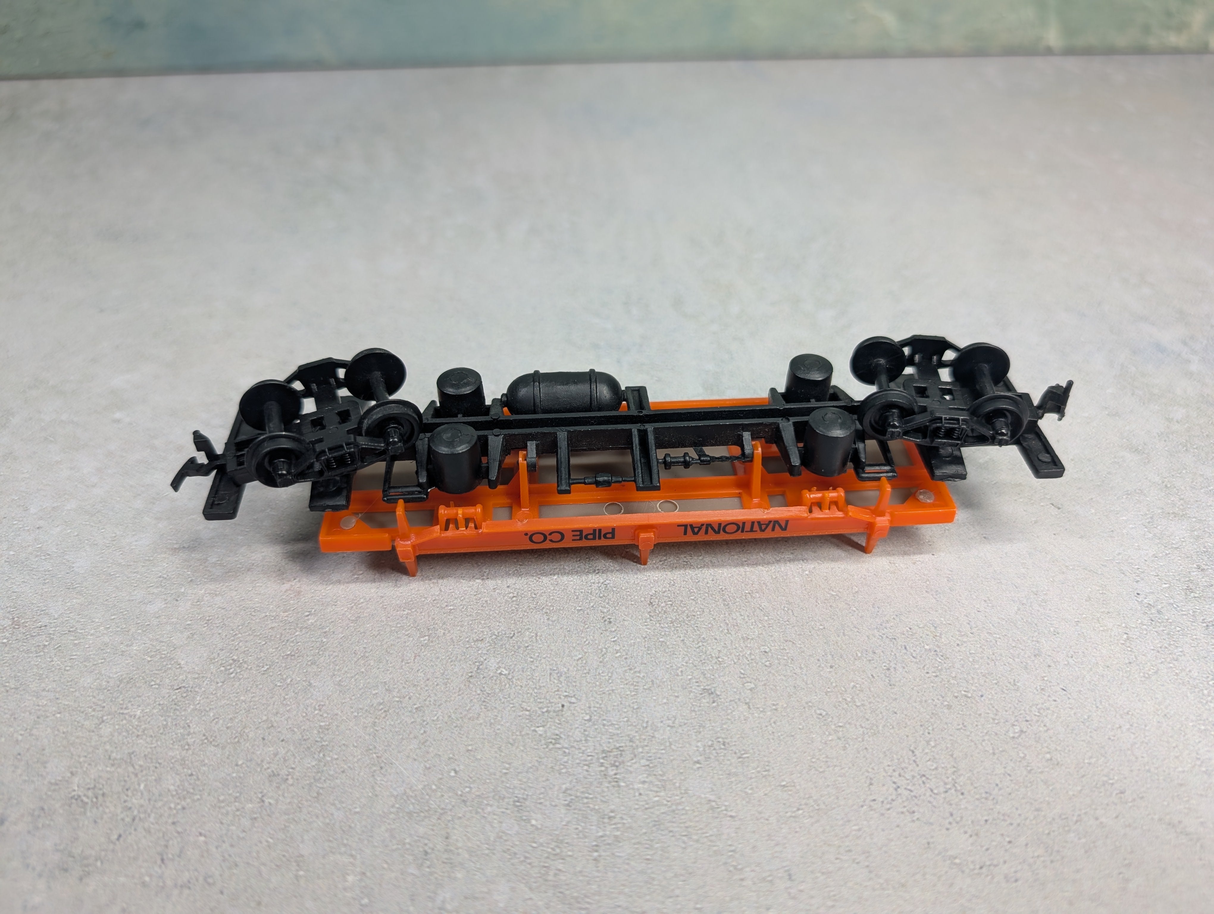 USED Life-Like HO Scale Pipe Dumping Car National Pipe Co