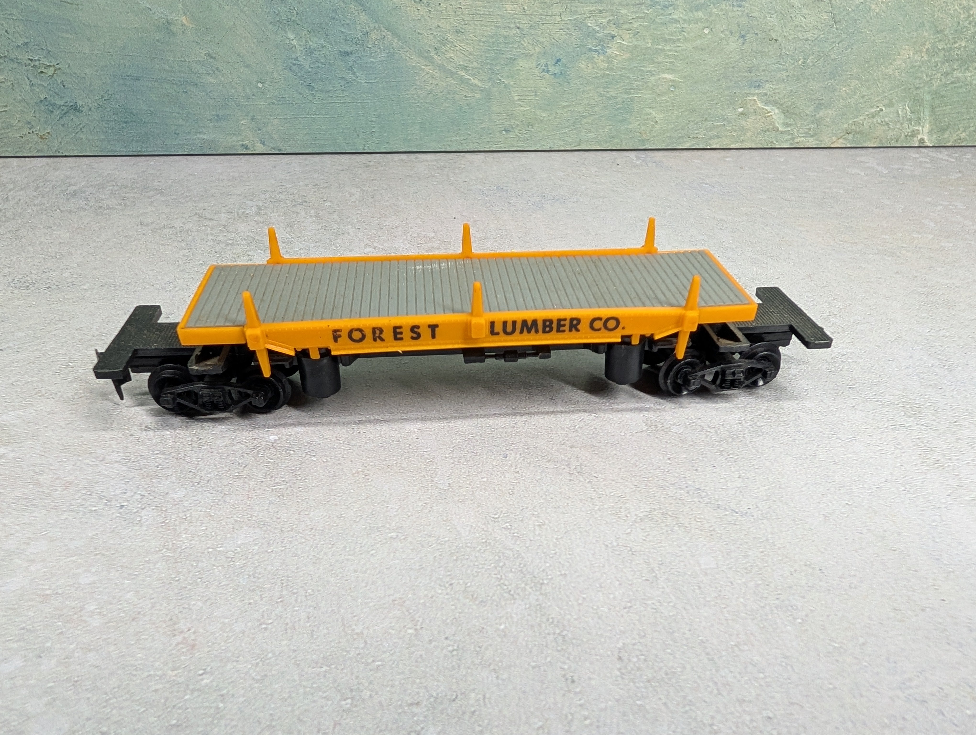 USED Life-Like HO Scale 40' Log Dumper Flat Car Forest Lumber Co