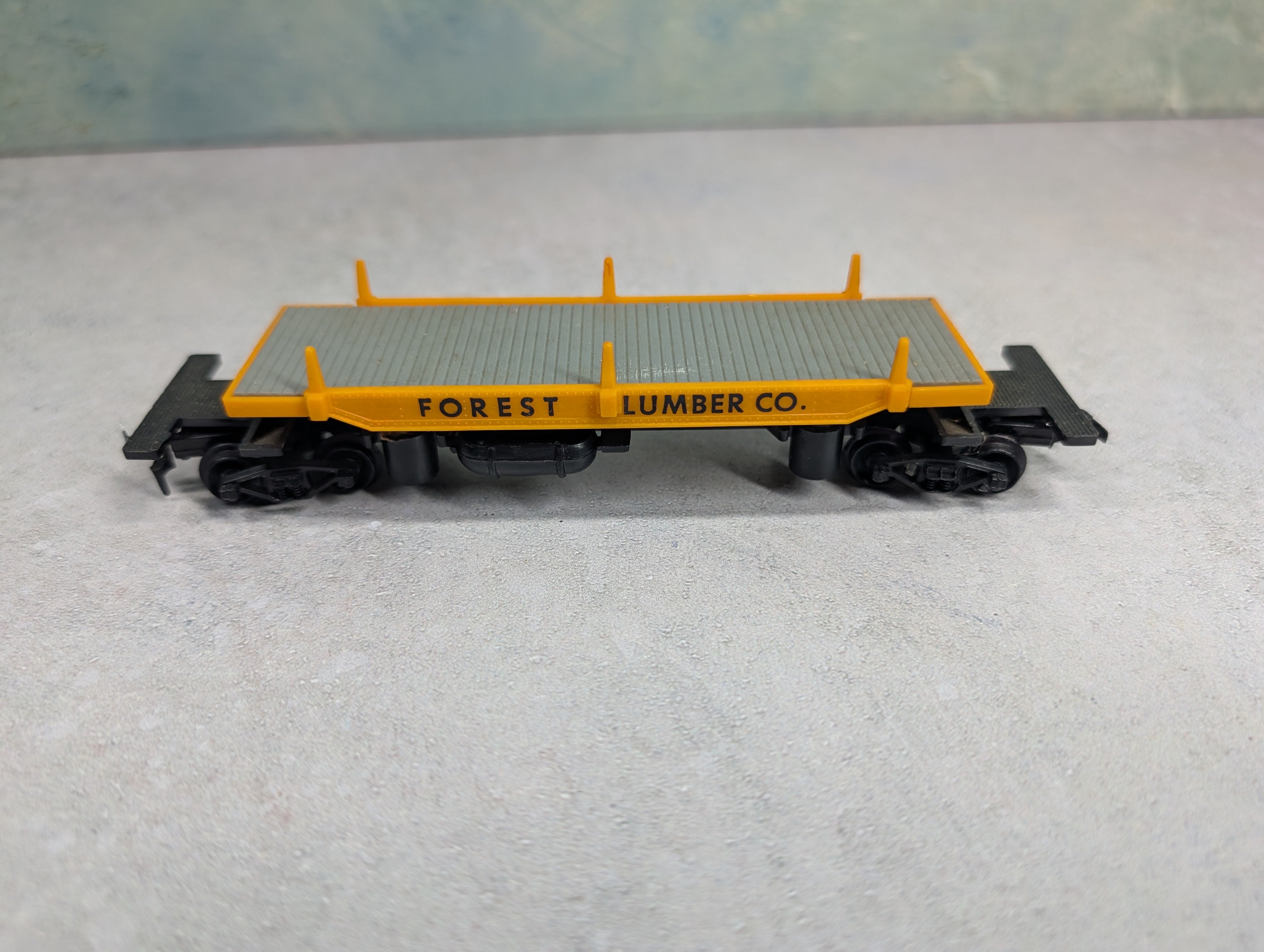 USED Life-Like HO Scale 40' Log Dumper Flat Car Forest Lumber Co