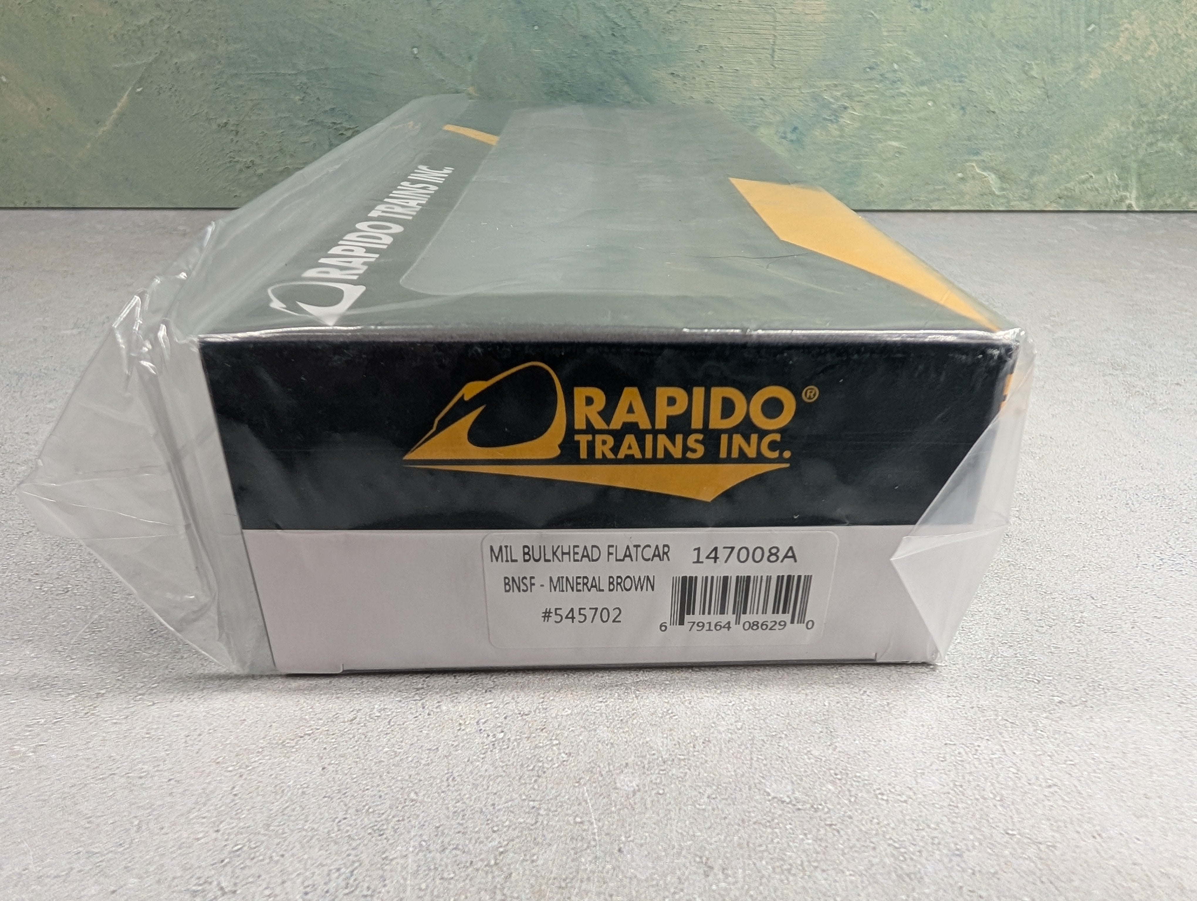 Rapido 147008 HO Scale Bulkhead Flatcar BNSF #545702 Mineral Brown