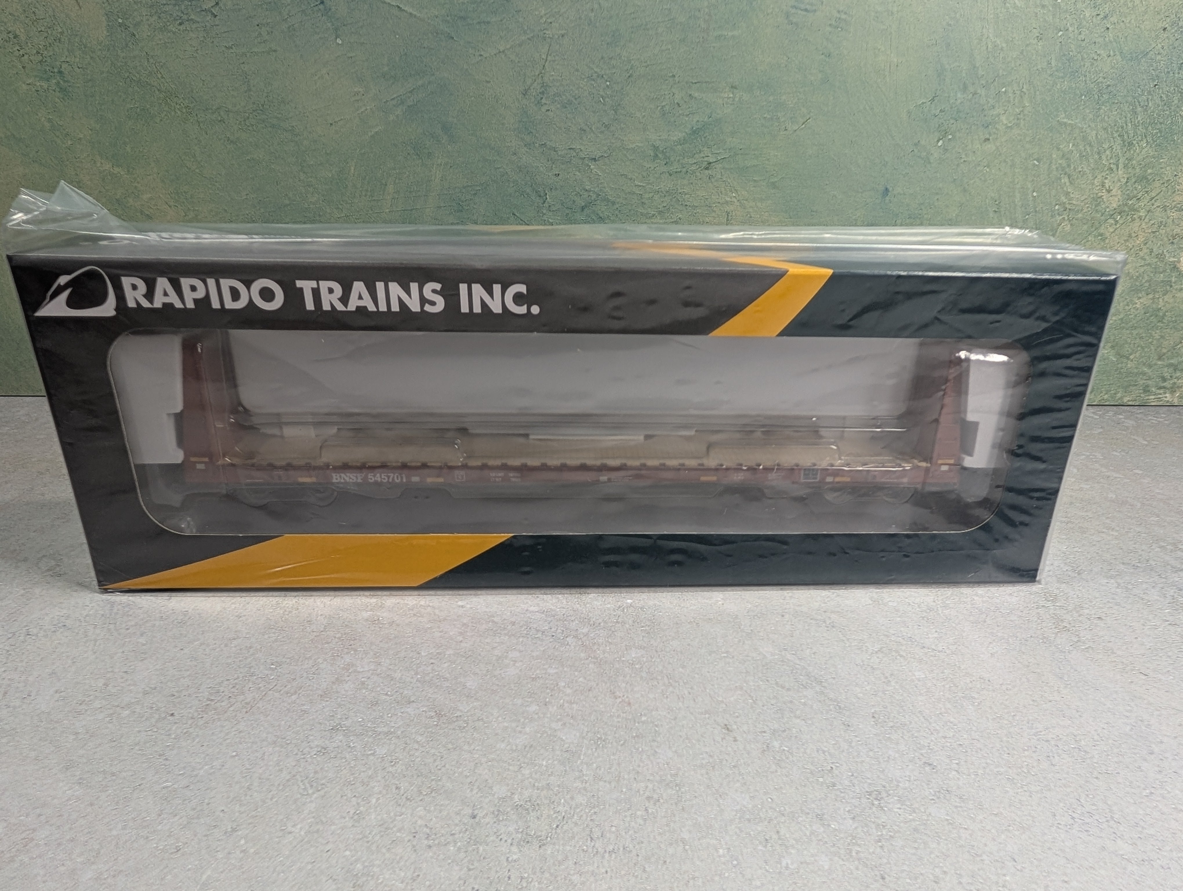 Rapido 147008 HO Scale Bulkhead Flatcar BNSF #545701 Mineral Brown