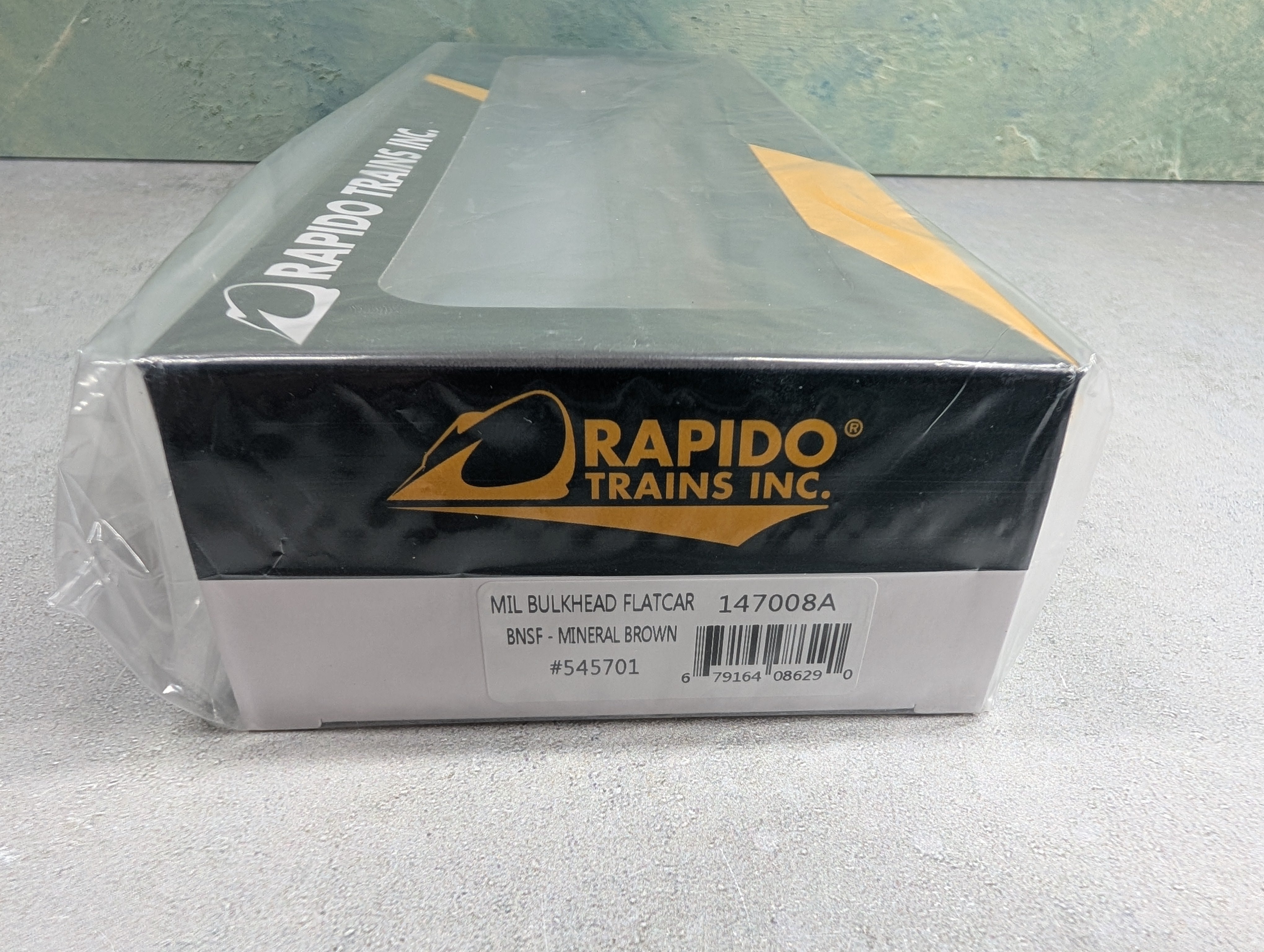 Rapido 147008 HO Scale Bulkhead Flatcar BNSF #545701 Mineral Brown