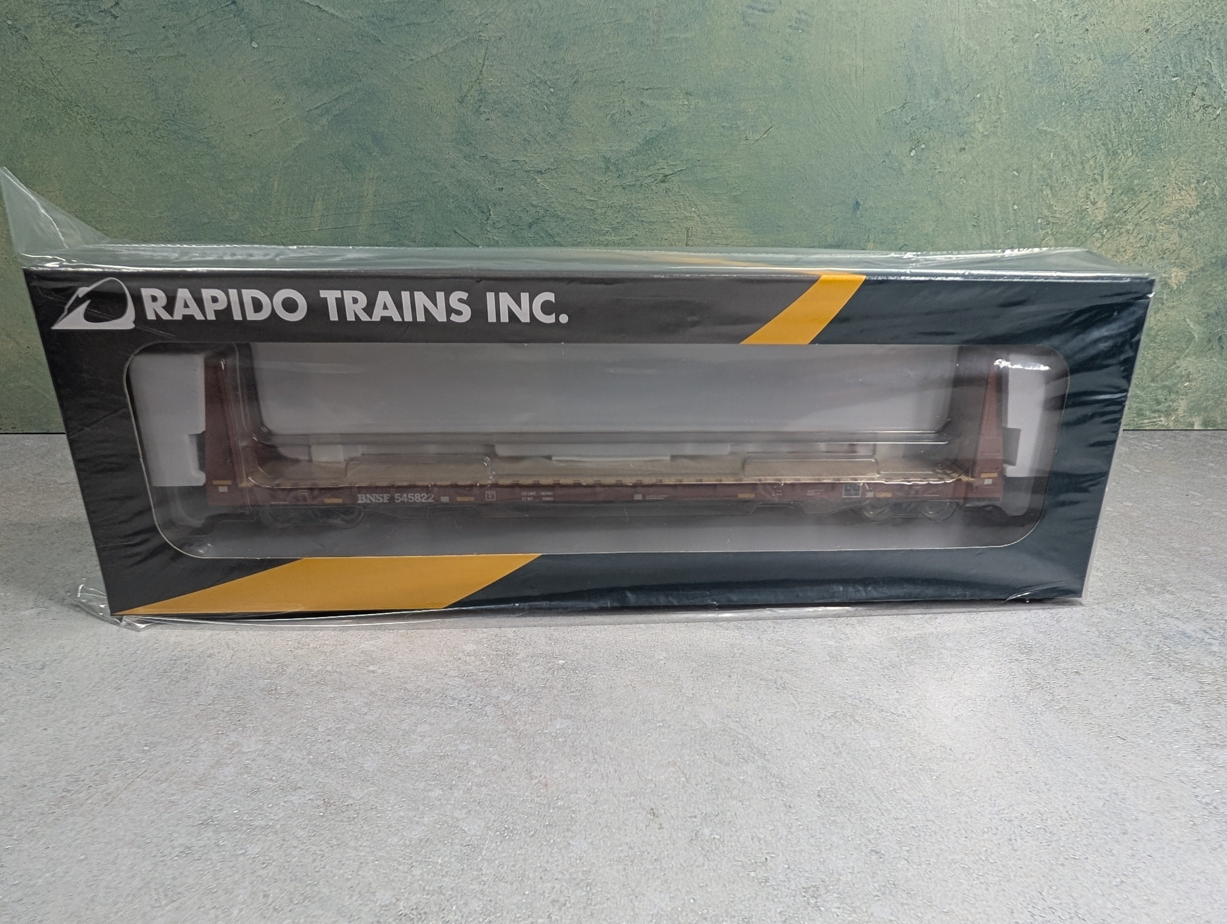 Rapido 147008 HO Scale Bulkhead Flatcar BNSF #545822 Mineral Brown