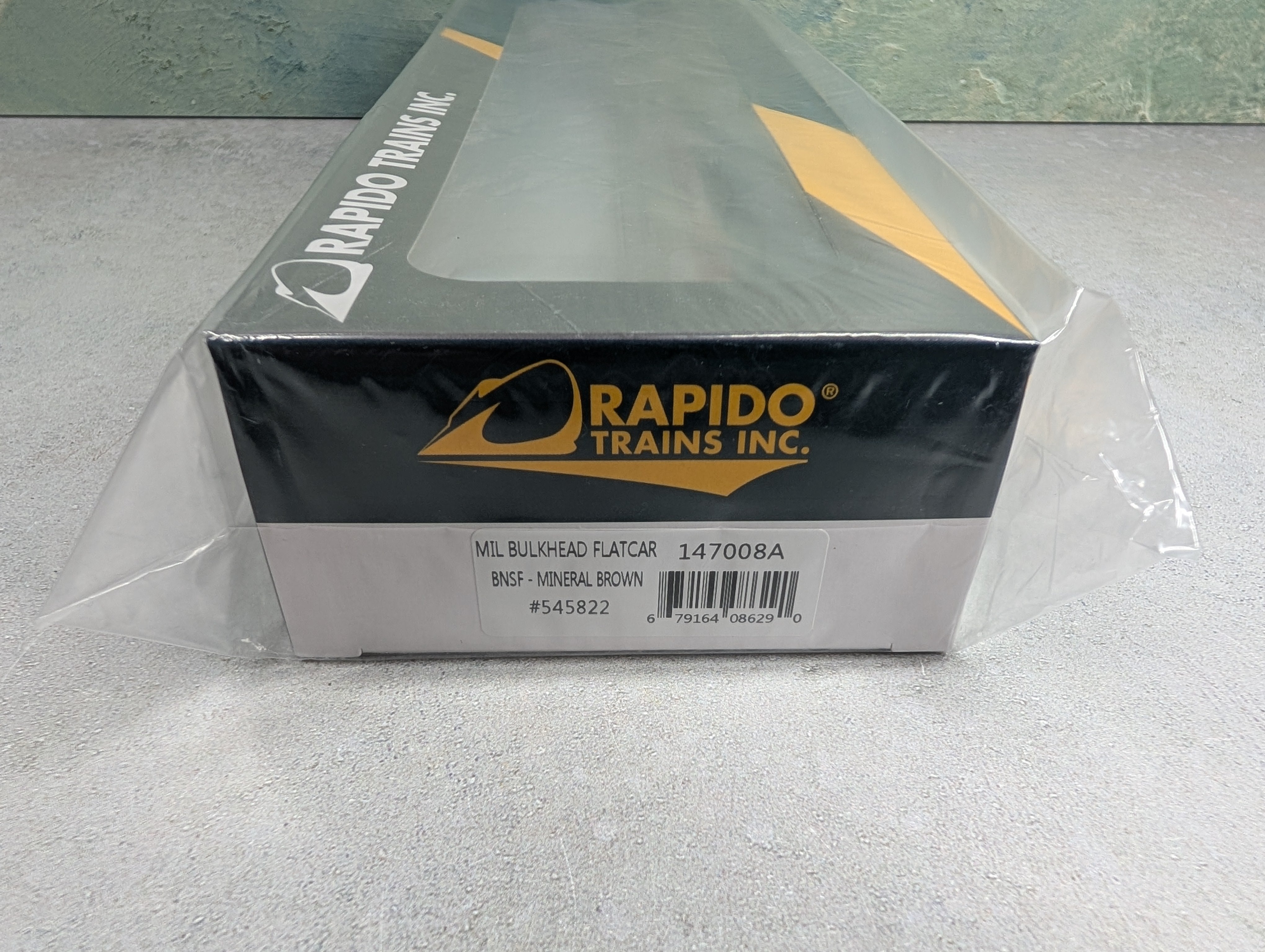 Rapido 147008 HO Scale Bulkhead Flatcar BNSF #545822 Mineral Brown