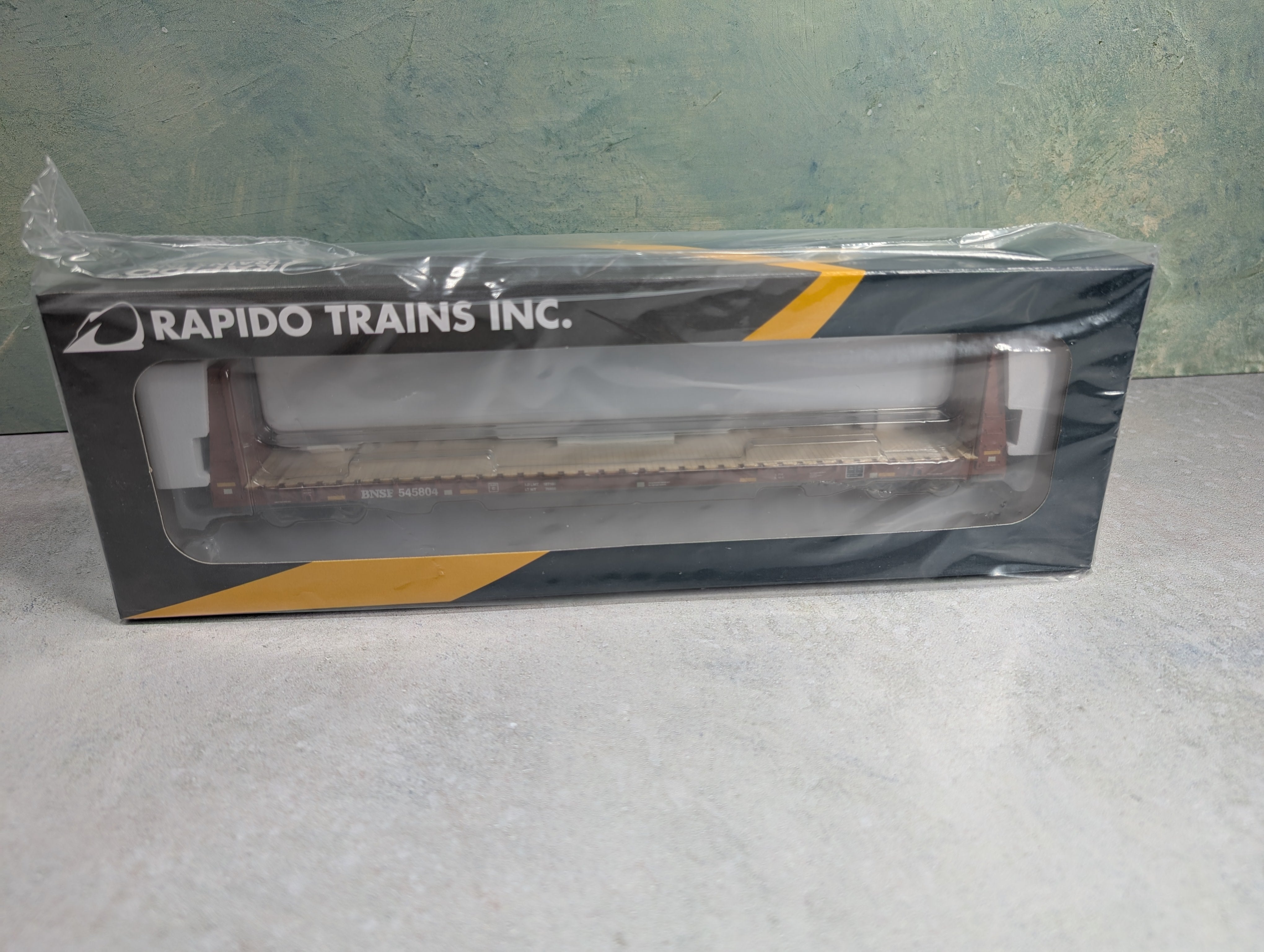 Rapido 147008 HO Scale Bulkhead Flatcar BNSF #545804 Mineral Brown
