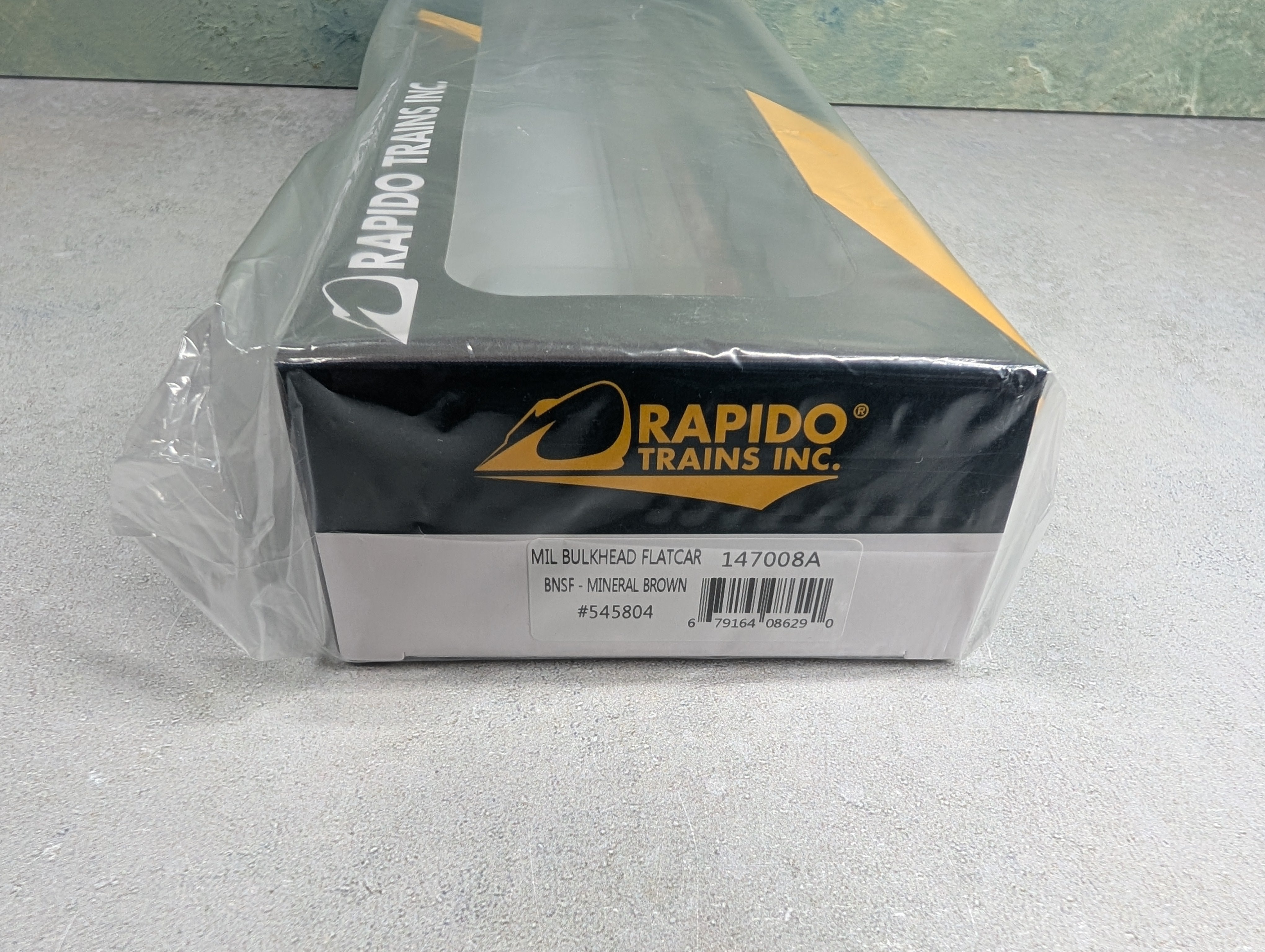 Rapido 147008 HO Scale Bulkhead Flatcar BNSF #545804 Mineral Brown