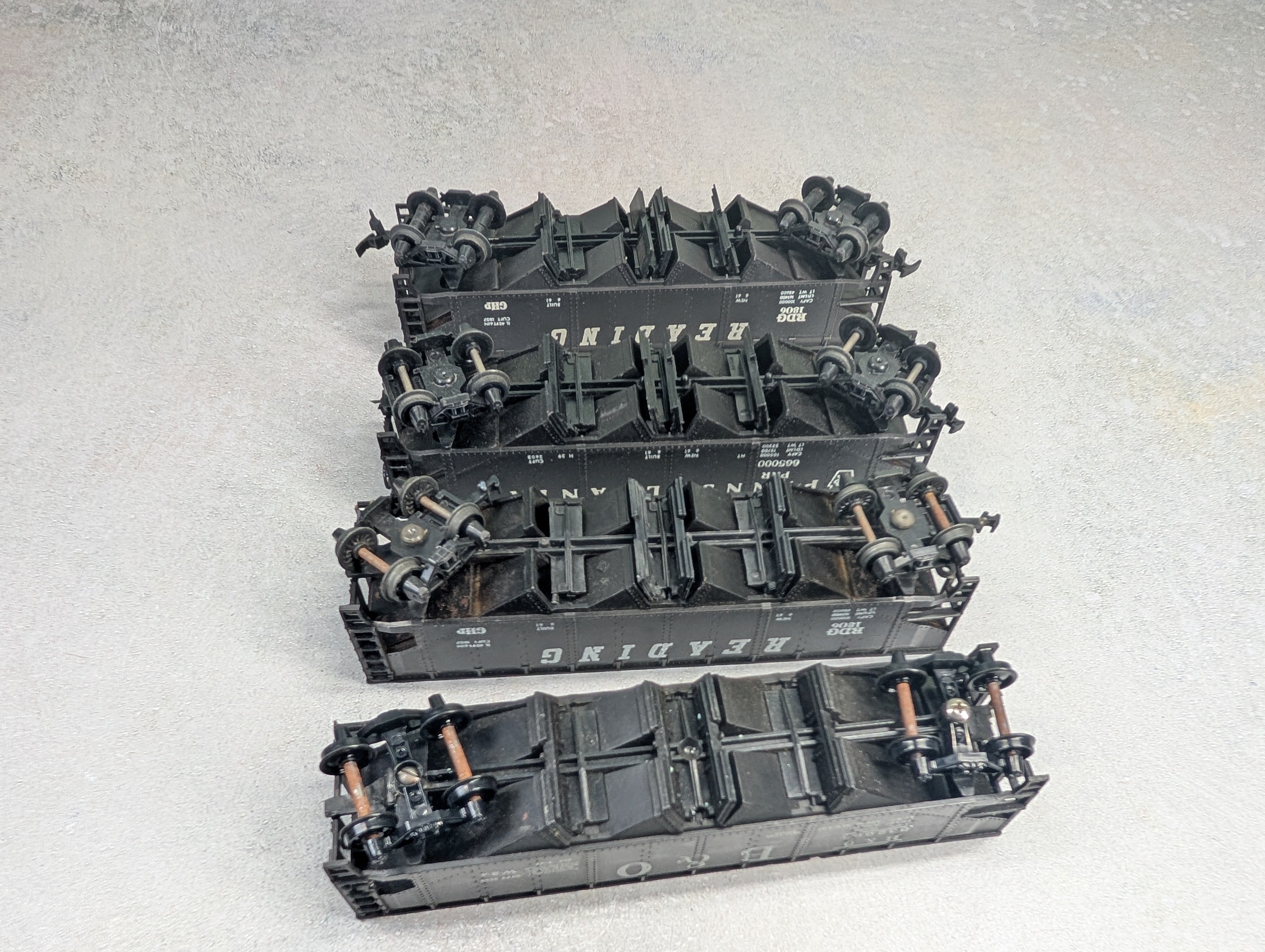 USED AHM HO Scale Lot of Operating Quad Hoppers Reading, B&O, PRR (4 pcs)