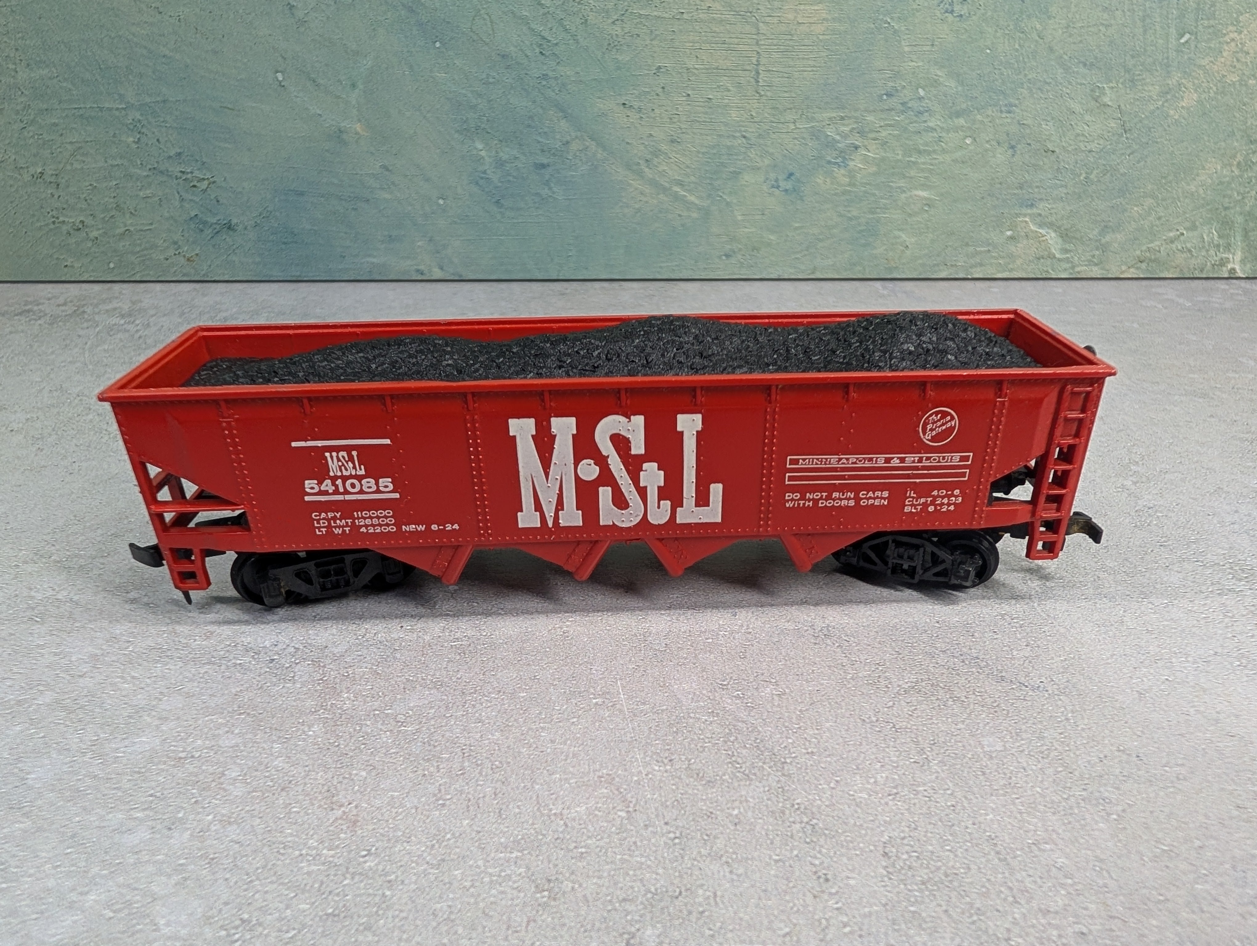 USED Bachmann HO Scale Quad Hopper w/ Coal Load MSTL #541085