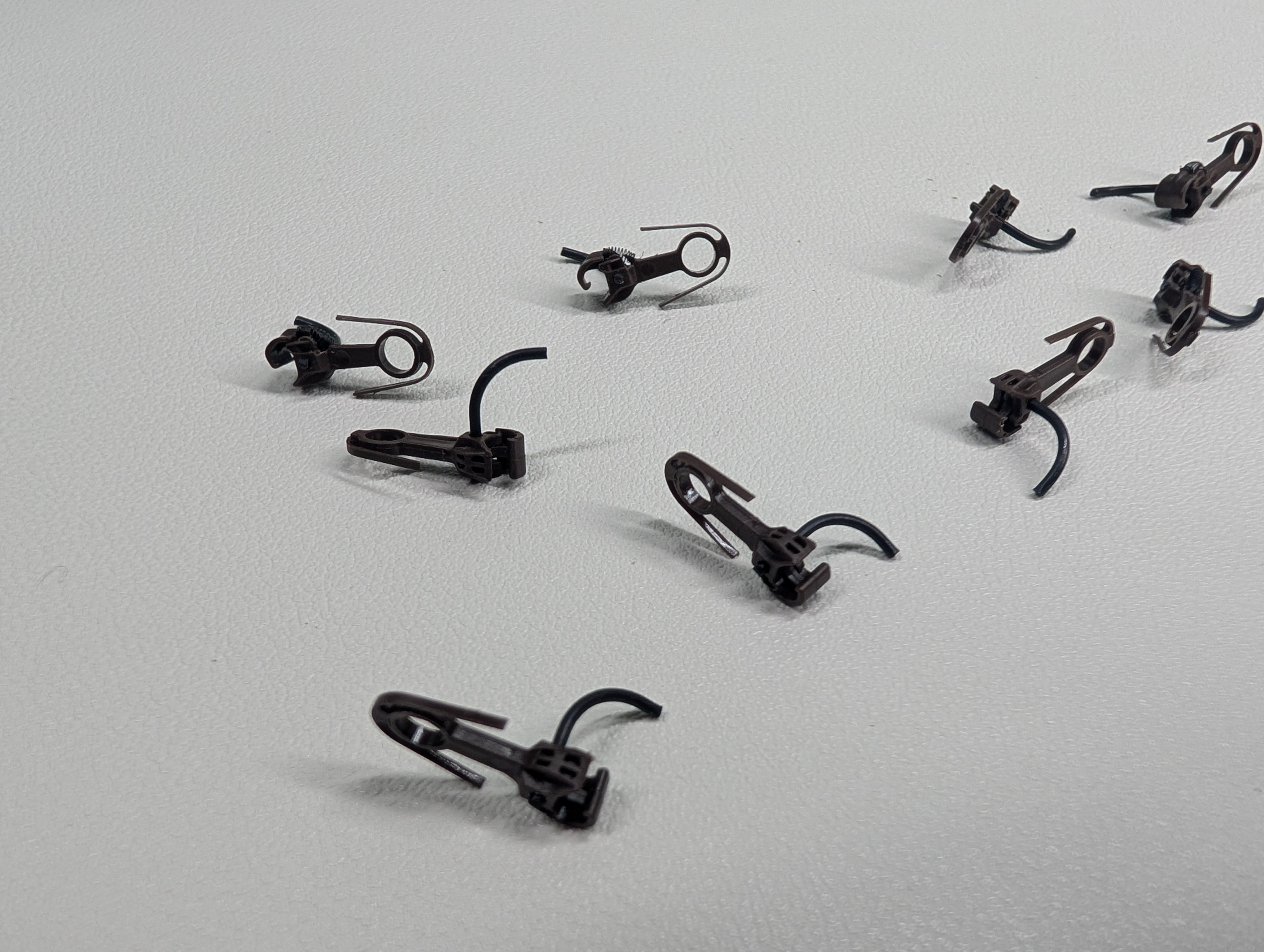 USED HO Scale Scale Rust Colored Self-Centering Plastic Knuckle Coupler (10 pcs)