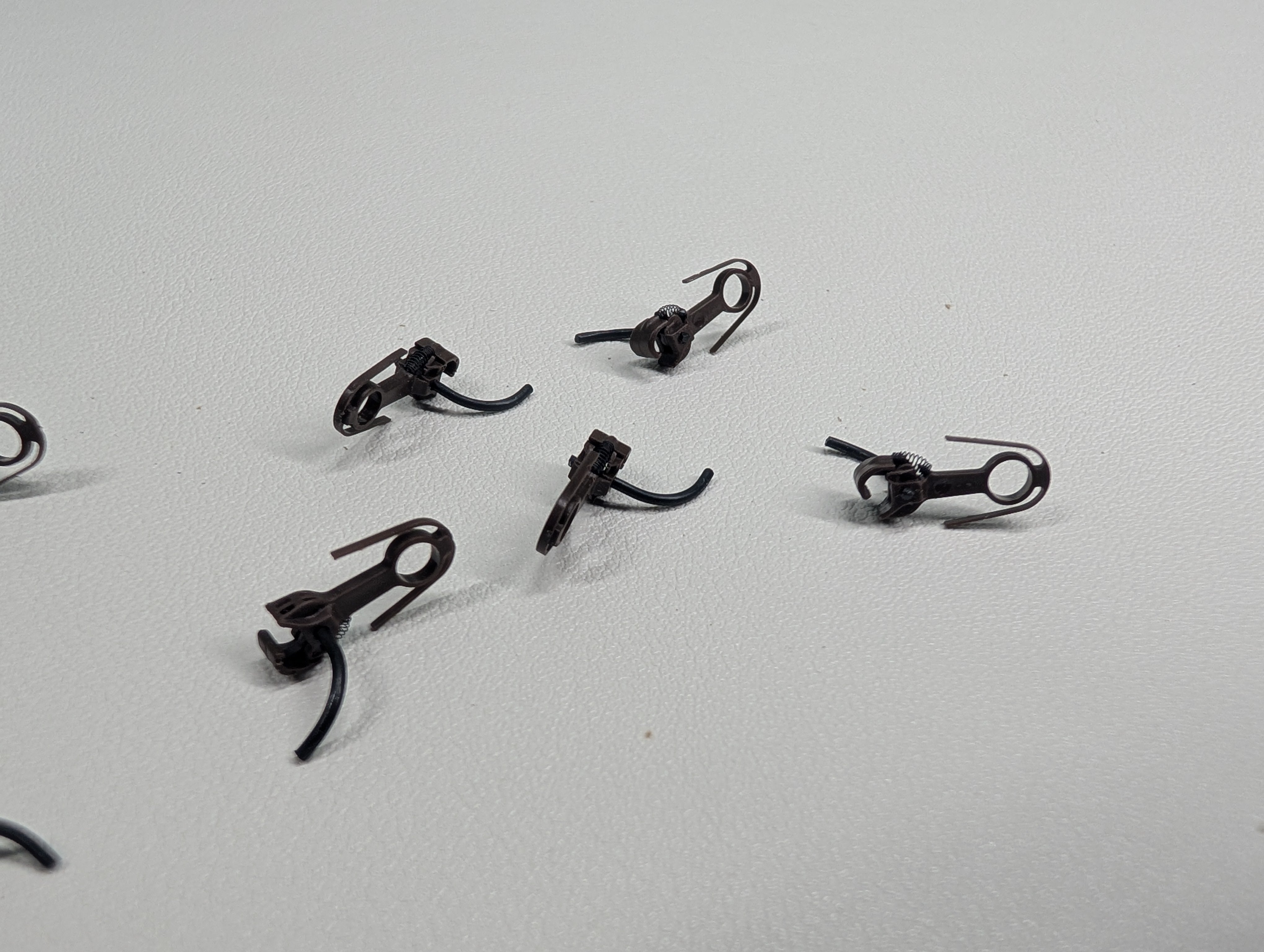 USED HO Scale Scale Rust Colored Self-Centering Plastic Knuckle Coupler (10 pcs)