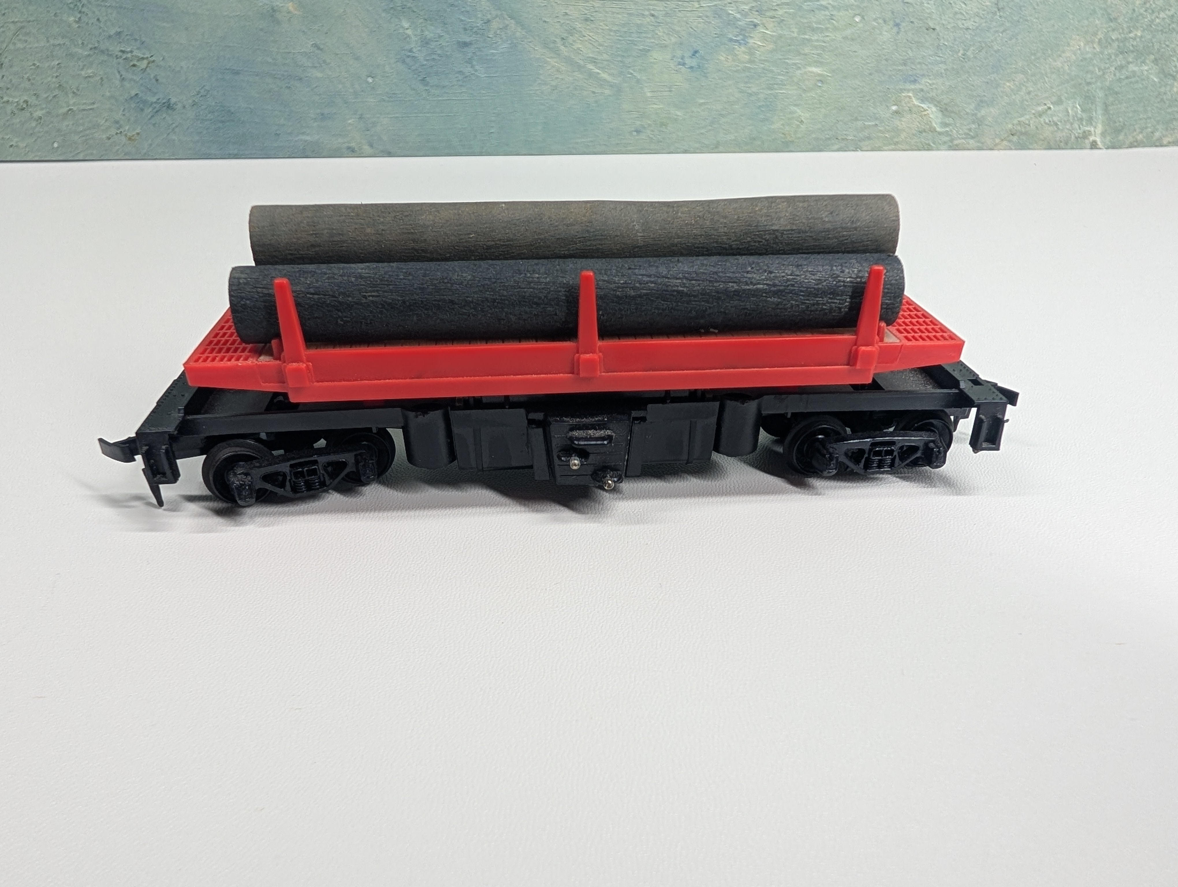 USED Tyco HO Scale Log Dumping Flat Car w/ Logs & Bin