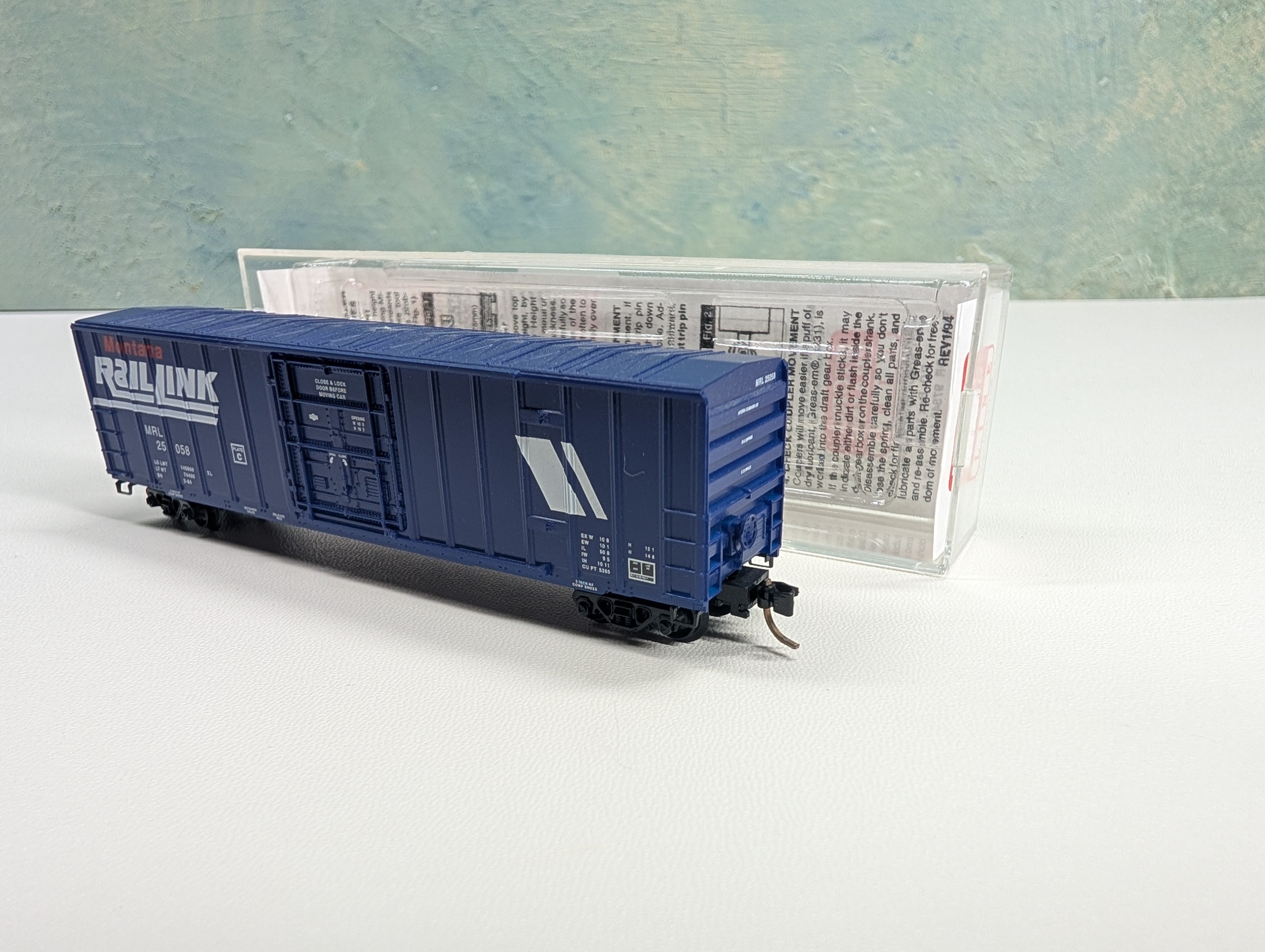USED Micro-Trains 27240 N Scale 50' Rib Side Box Car Plug Door w/o Roofwalk Montana Rail Link MRL #25058