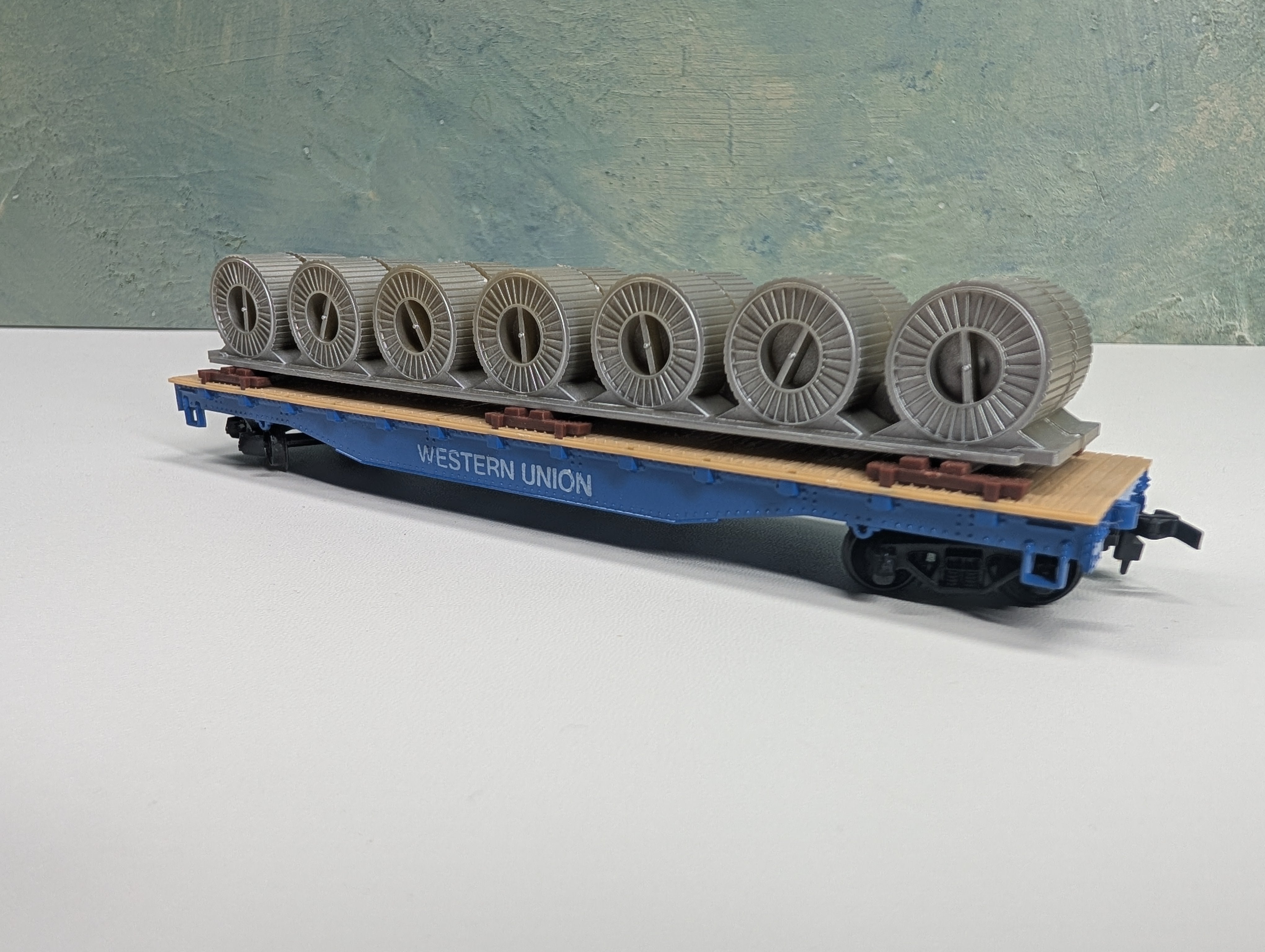 USED Tyco HO Scale Flat Car w/ Coil Load Western Union