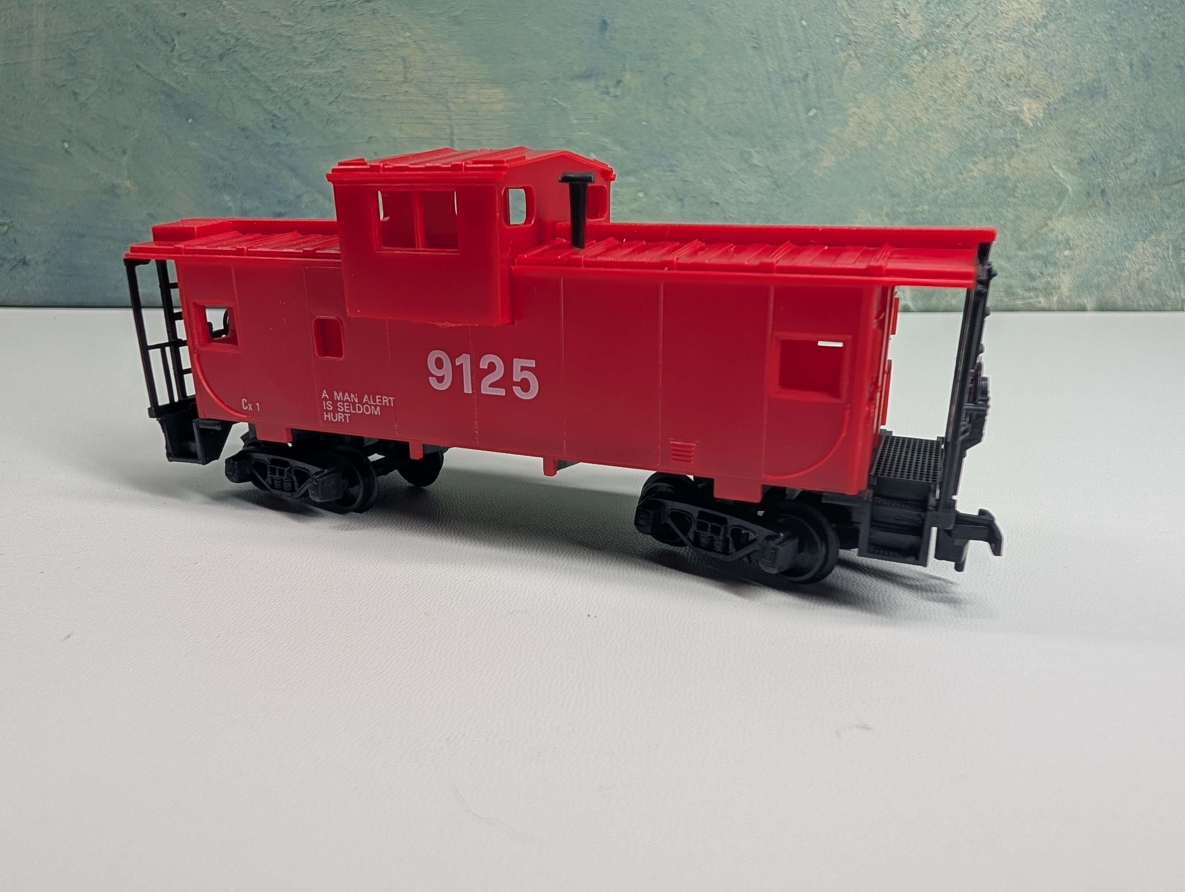 USED Model Power HO Scale A Man Alert is Seldom Hurt Red Caboose #9125