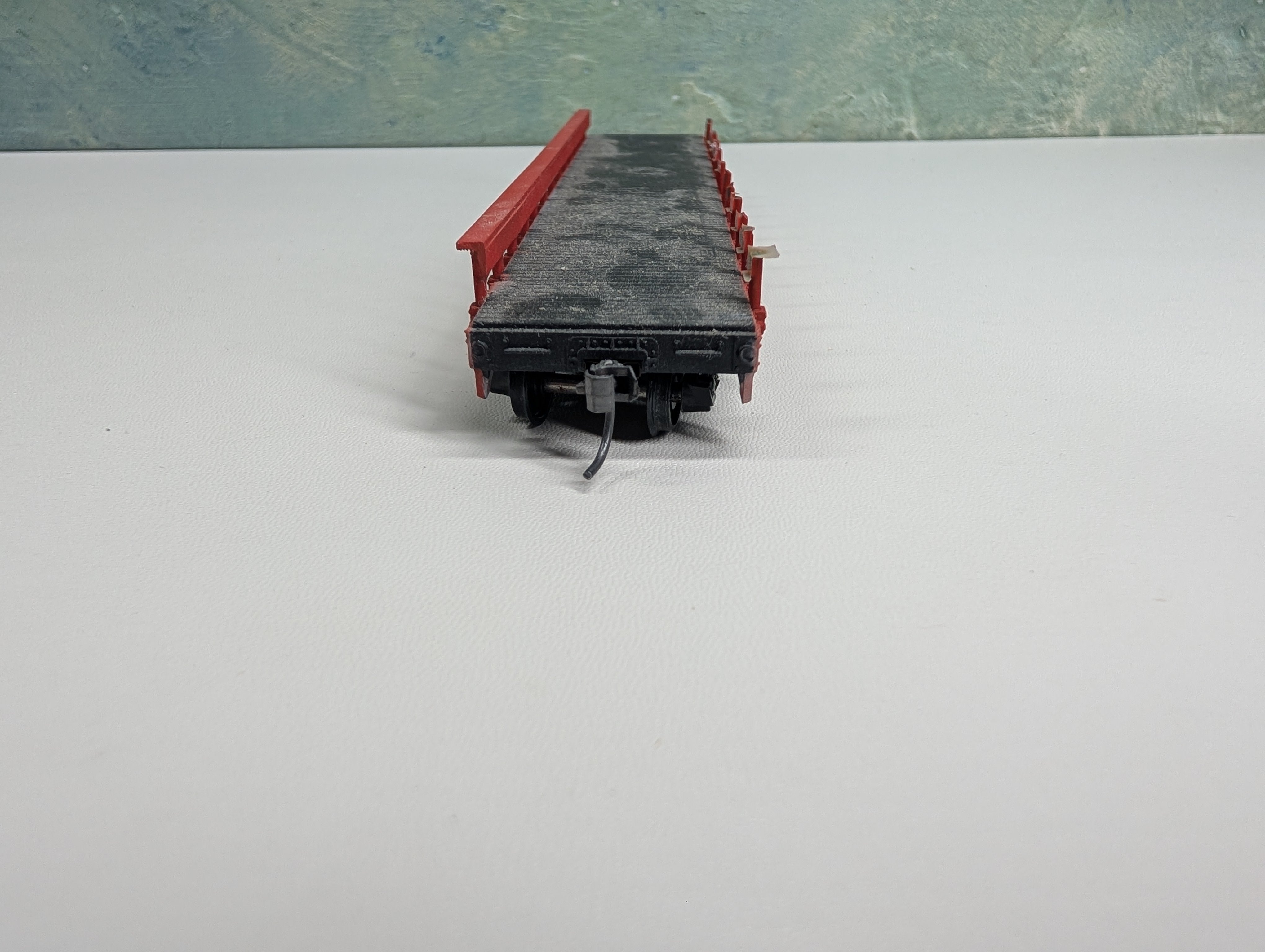 USED Athearn HO Scale Red 50' Flat Car w/ Stakes T30