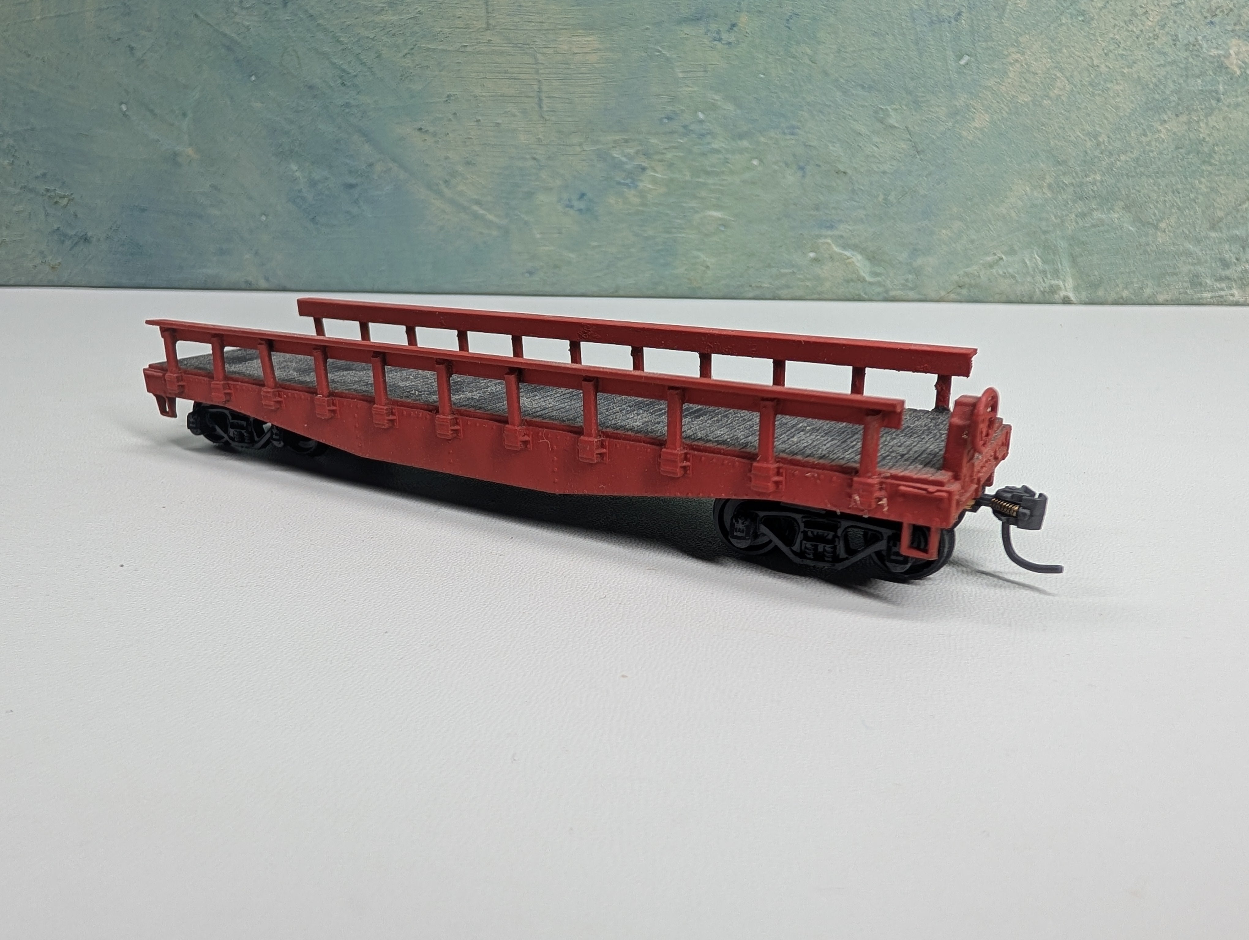 USED Athearn HO Scale Red 40' Flat Car w/ Stakes