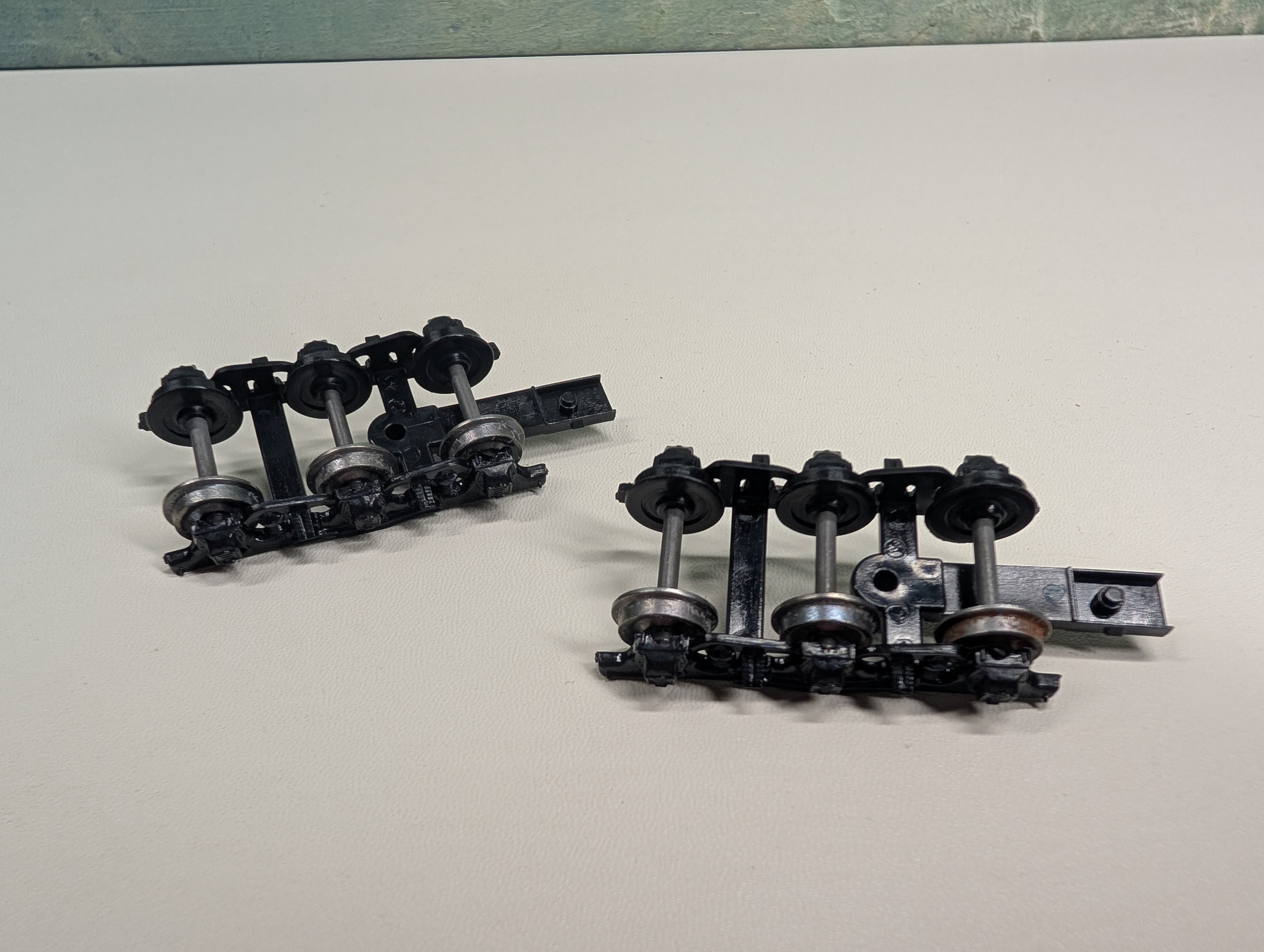 USED HO Scale Pair of Three Axle Passenger Car Trucks