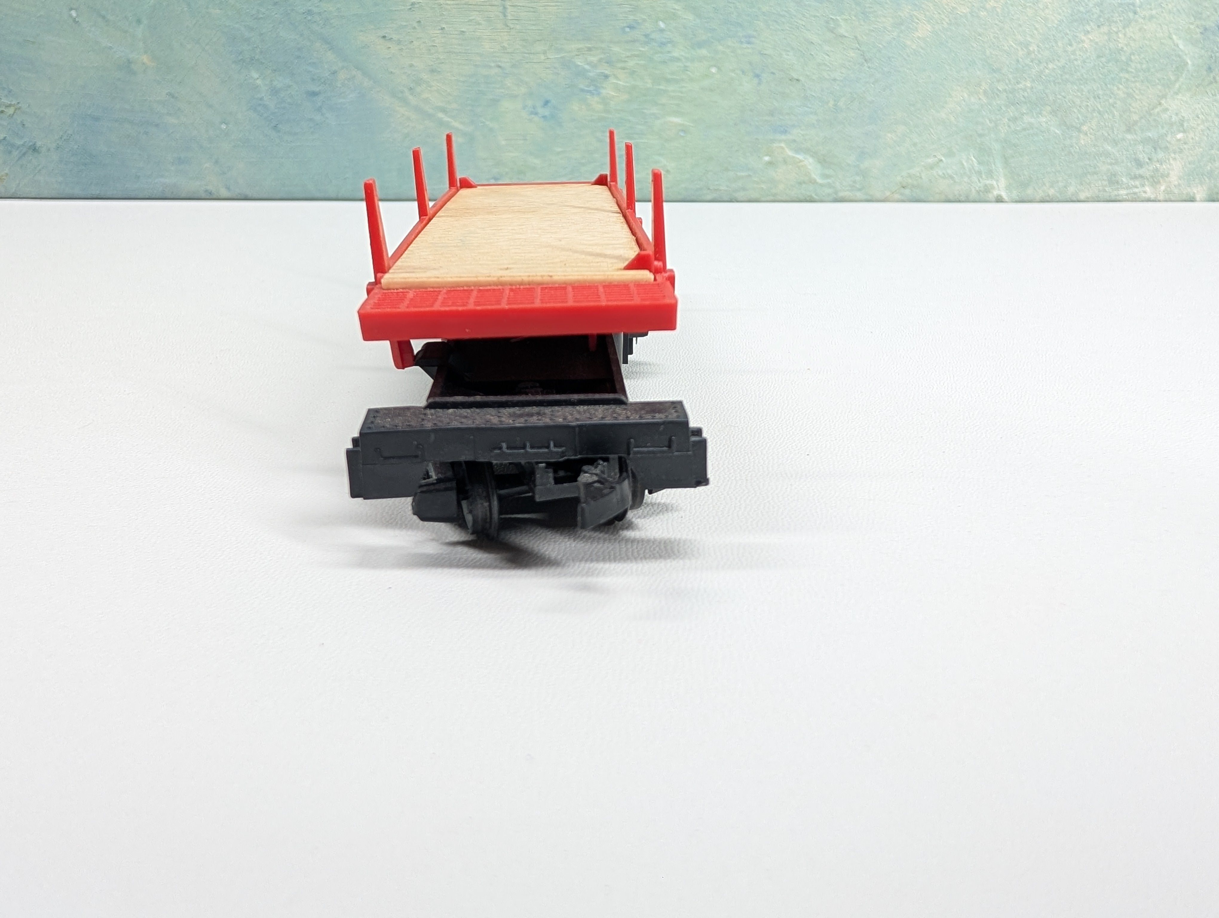 USED Tyco HO Scale Dumping Flat Car w/ Stakes