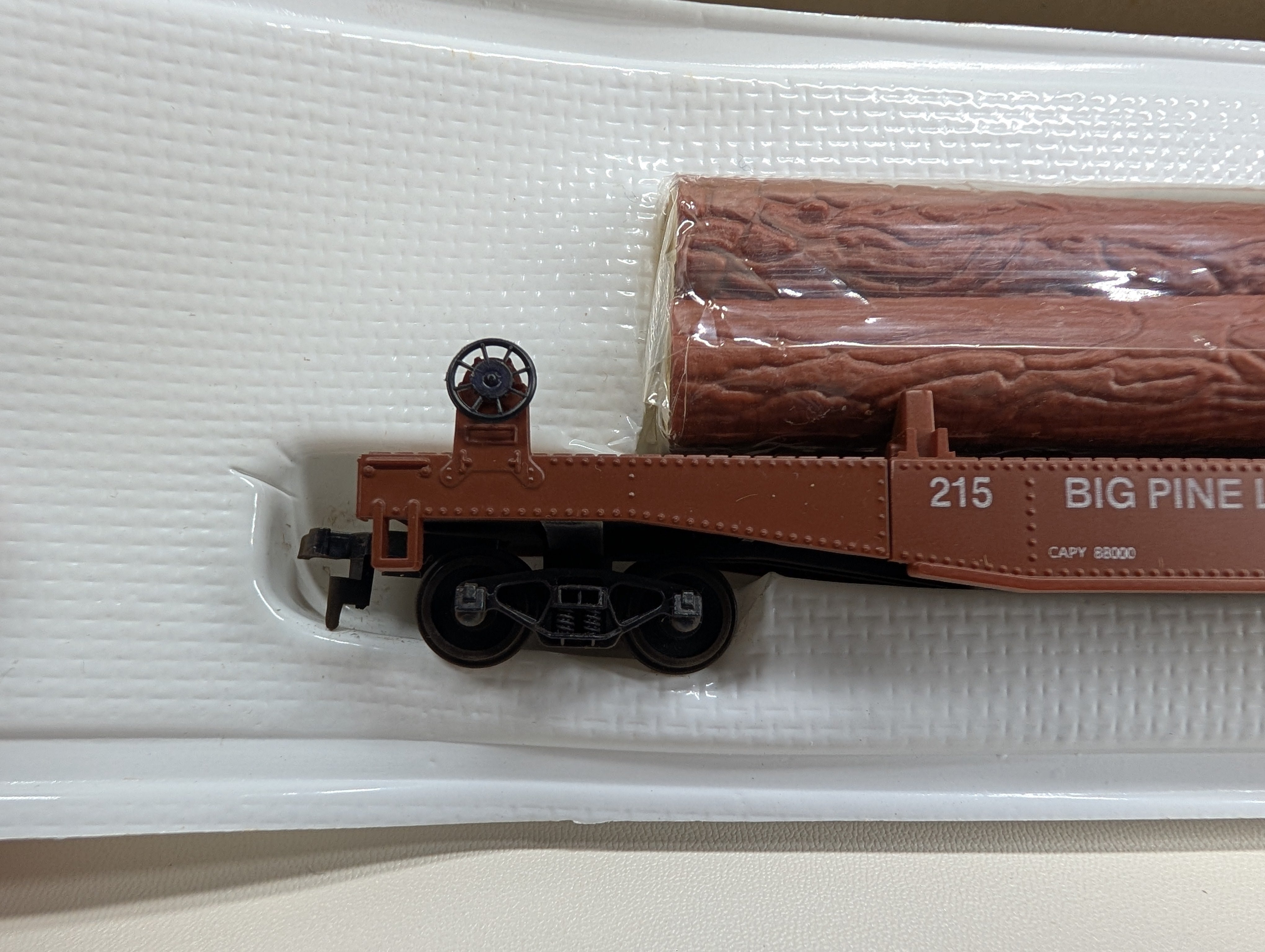 USED Cox 6152 HO Scale Log Dump Car w/ 3 Logs Big Pine Lumber CO #215