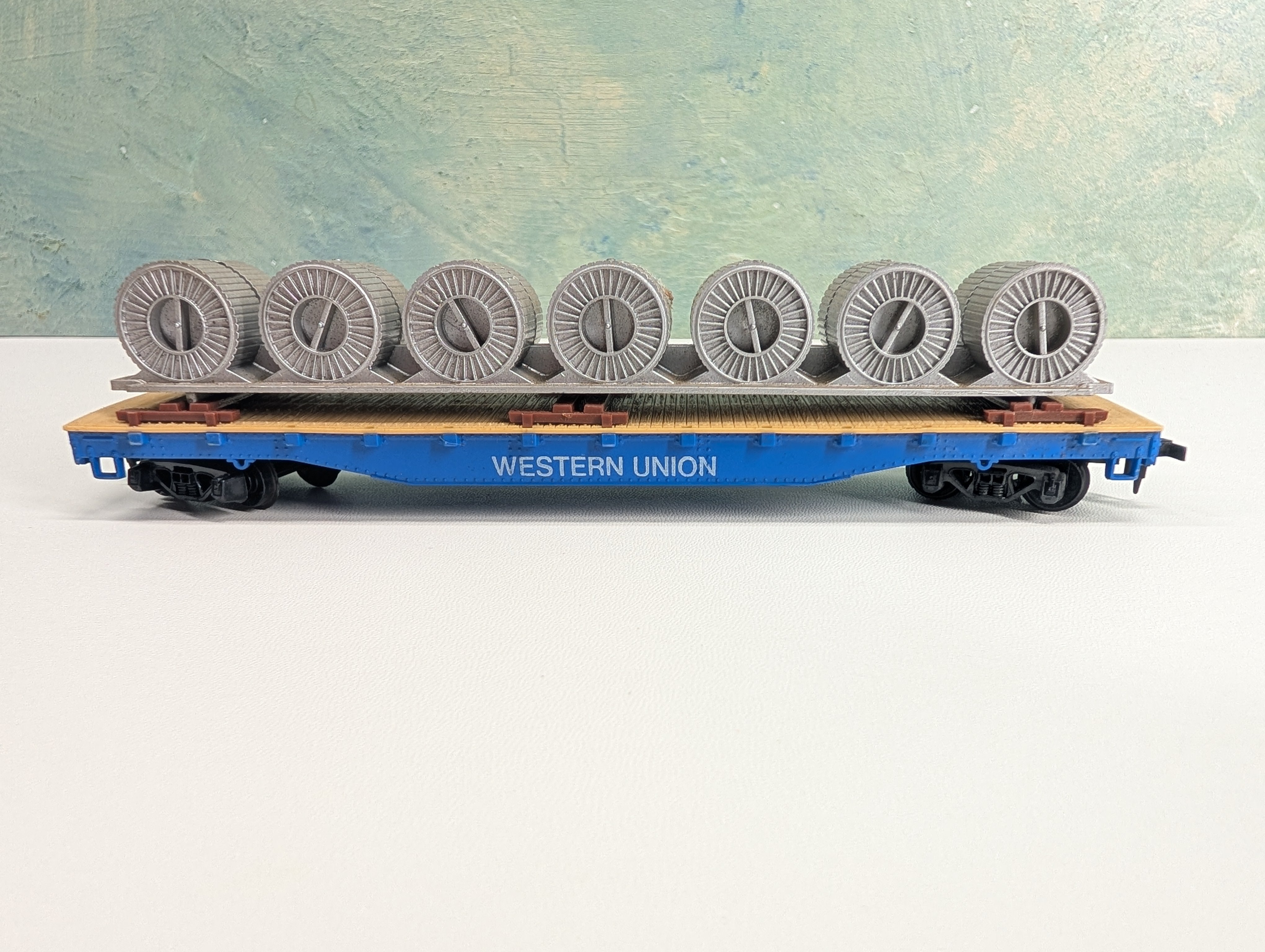 USED Tyco HO Scale 50' Flat Car w/ Coil Load Western Union