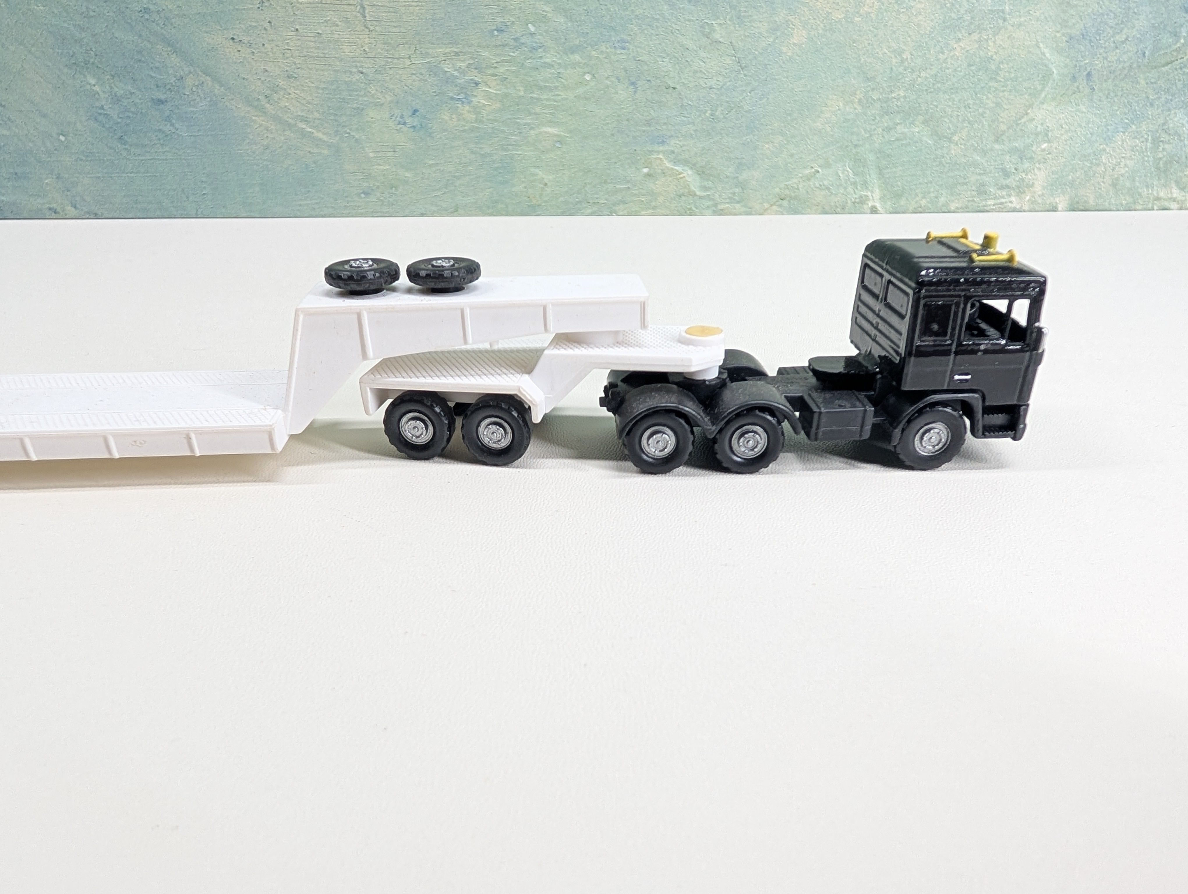 USED HO Scale Black Truck w/ Depressed Flatbed