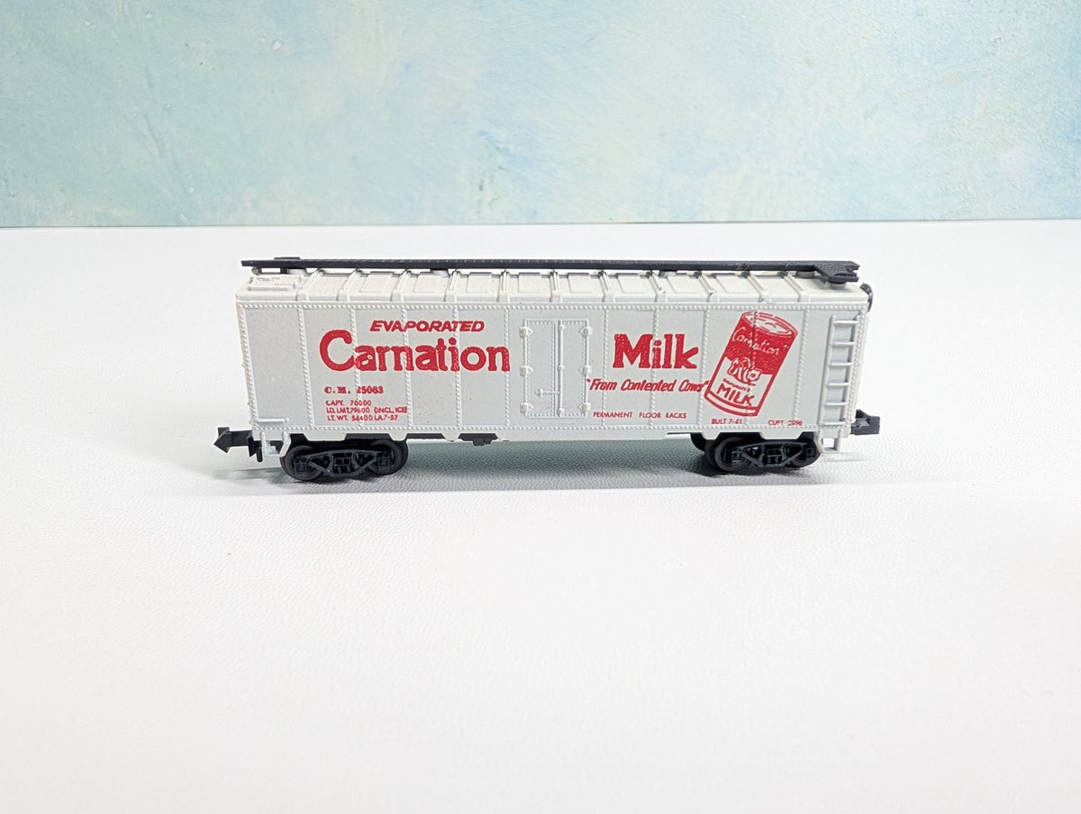 USED Postage Stamp Trains Aurora N Scale Box Car Carnation Milk CM #25063