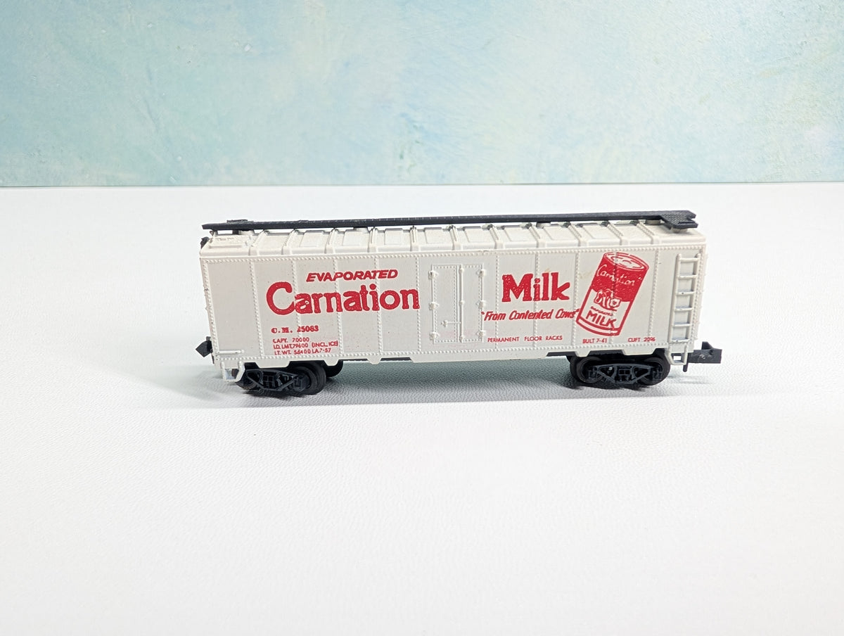 USED Postage Stamp Trains Aurora N Scale Box Car Carnation Milk CM #25063