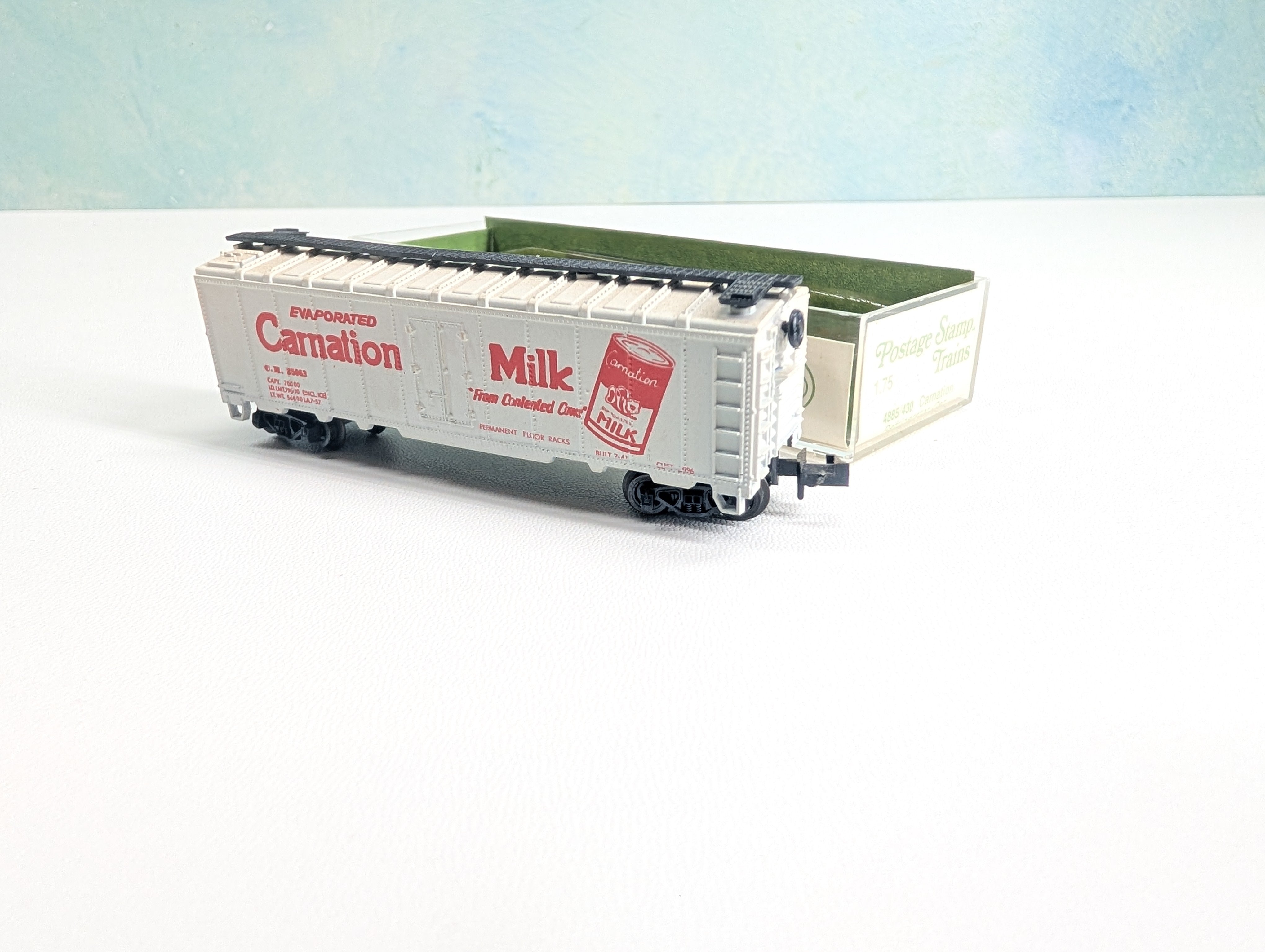 USED Postage Stamp Trains Aurora N Scale Box Car Carnation Milk CM #25063
