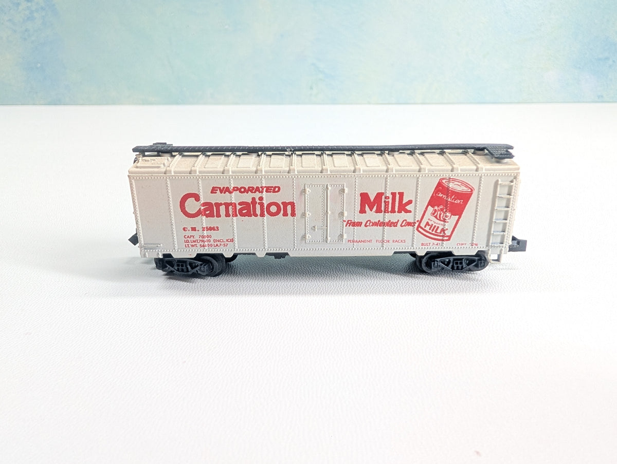 USED Postage Stamp Trains Aurora N Scale Box Car Carnation Milk CM #25063