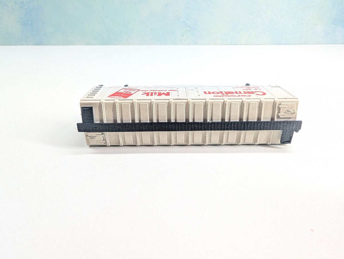 USED Postage Stamp Trains Aurora N Scale Box Car Carnation Milk CM #25063