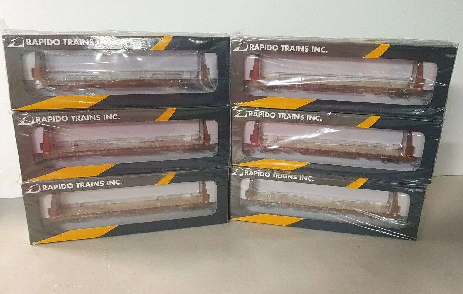 Rapido 147008 HO Scale, 6 Pack - Marine Industries Bulkhead Flatcar, BNSF , Mineral Brown Scheme