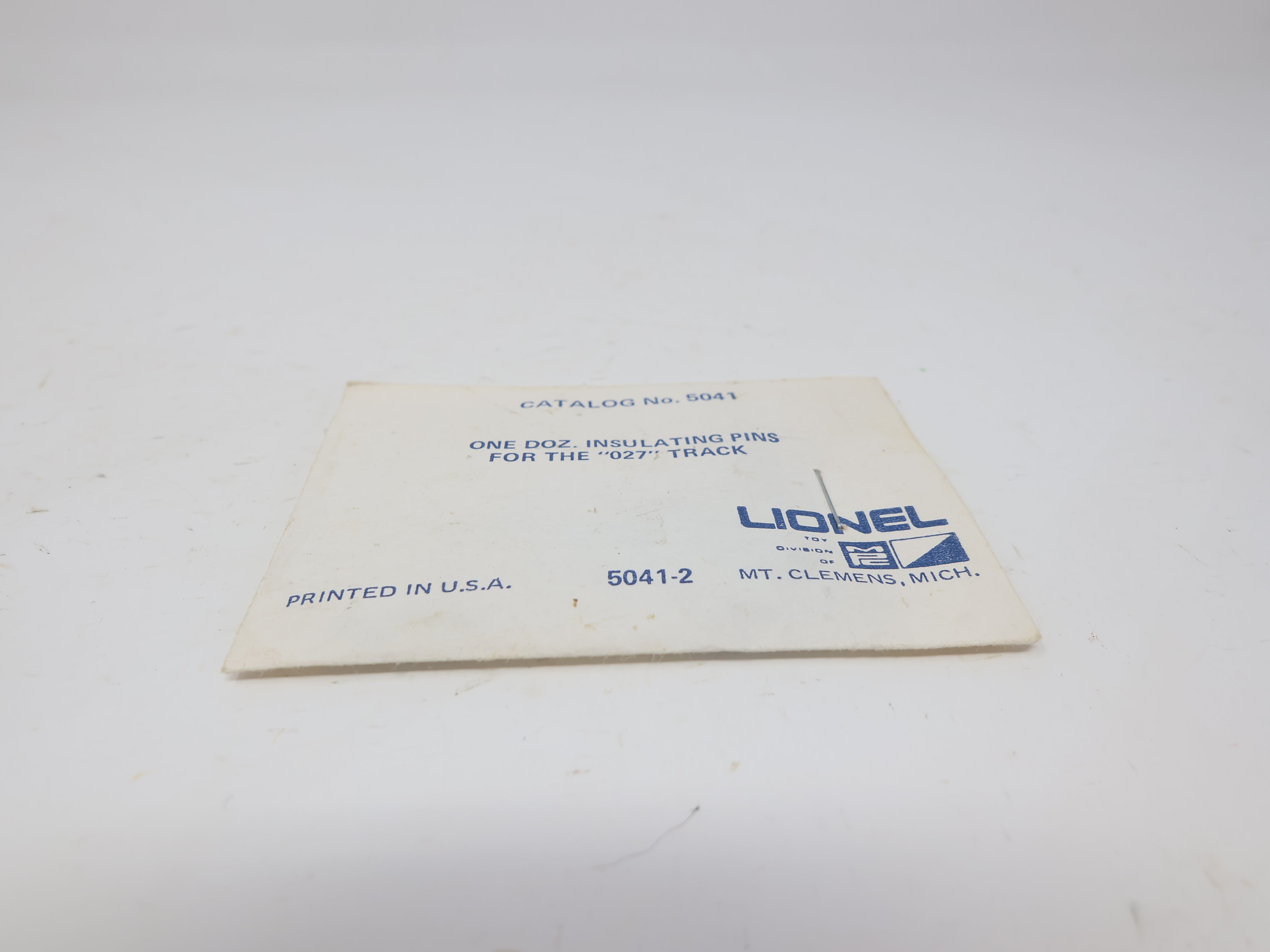 USED Lionel 5041 O, One dozen Insulating Pins for the "O27" Track