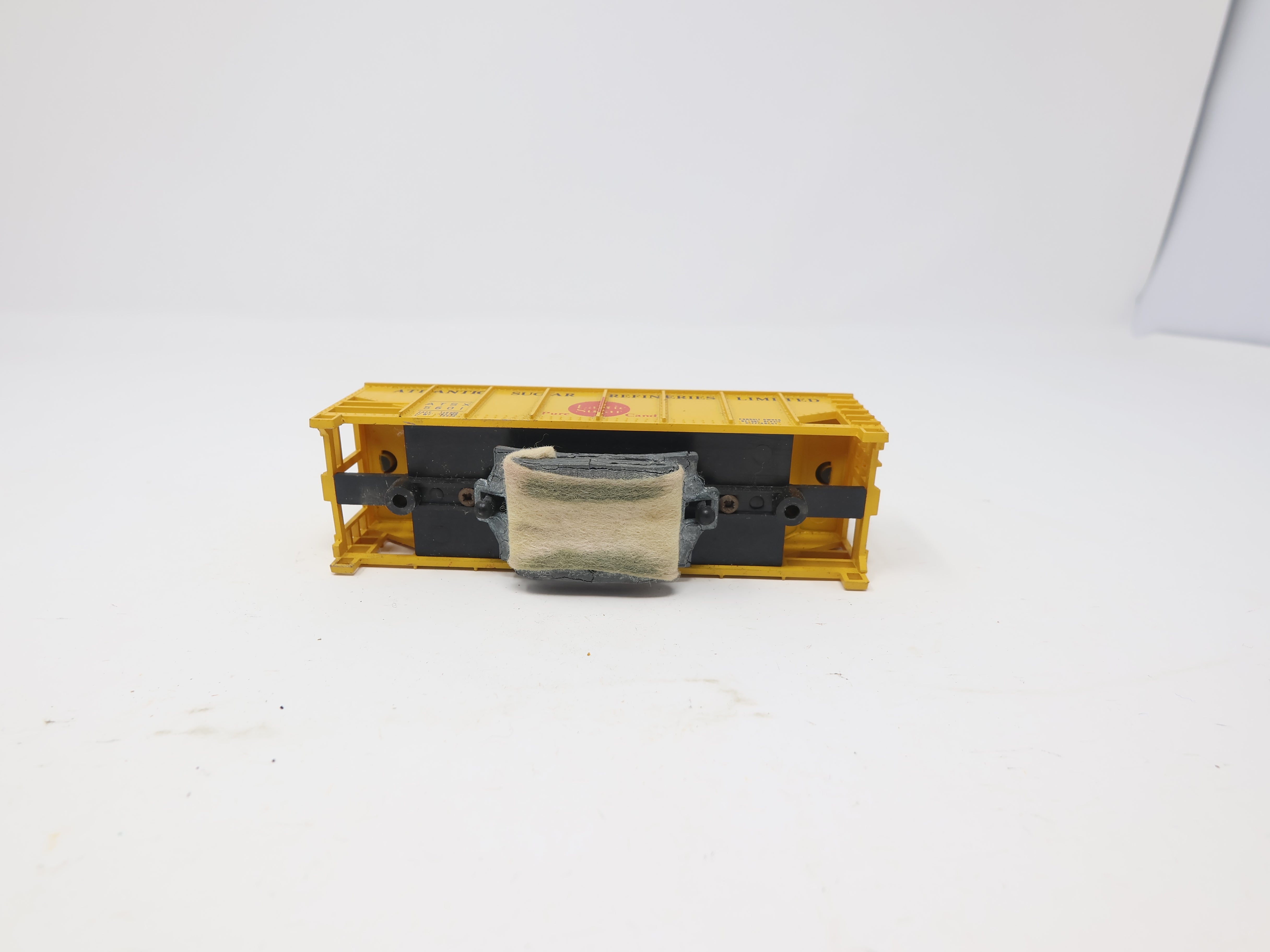 USED AHM HO Scale, 2 Bay Covered Hopper, Atlantic Sugar ATSX #5601, Track Cleaning Car, For Parts or Repairs