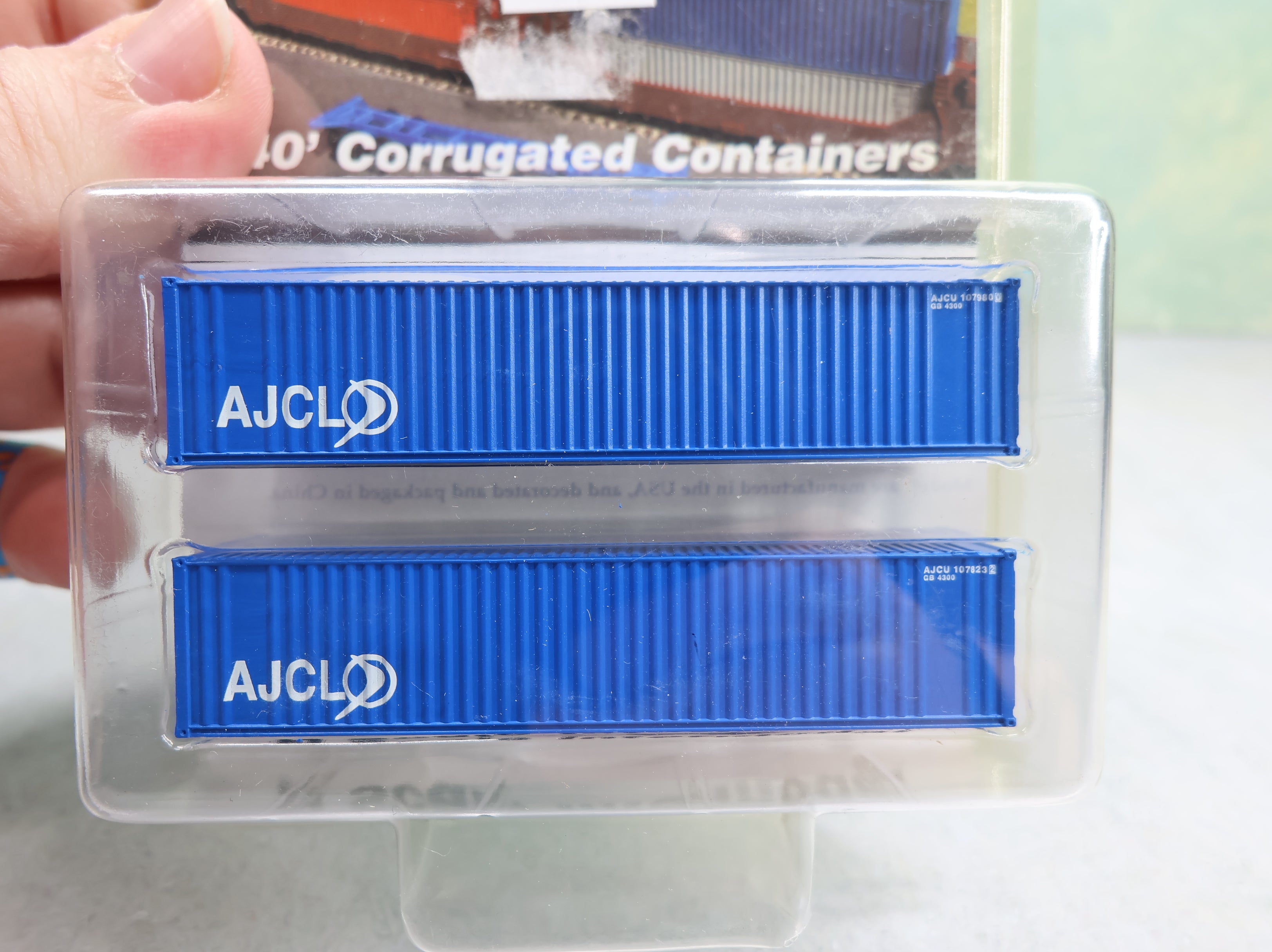 Deluxe 5340 N Scale 40' Corrugated Containers AJCL (2 pcs)