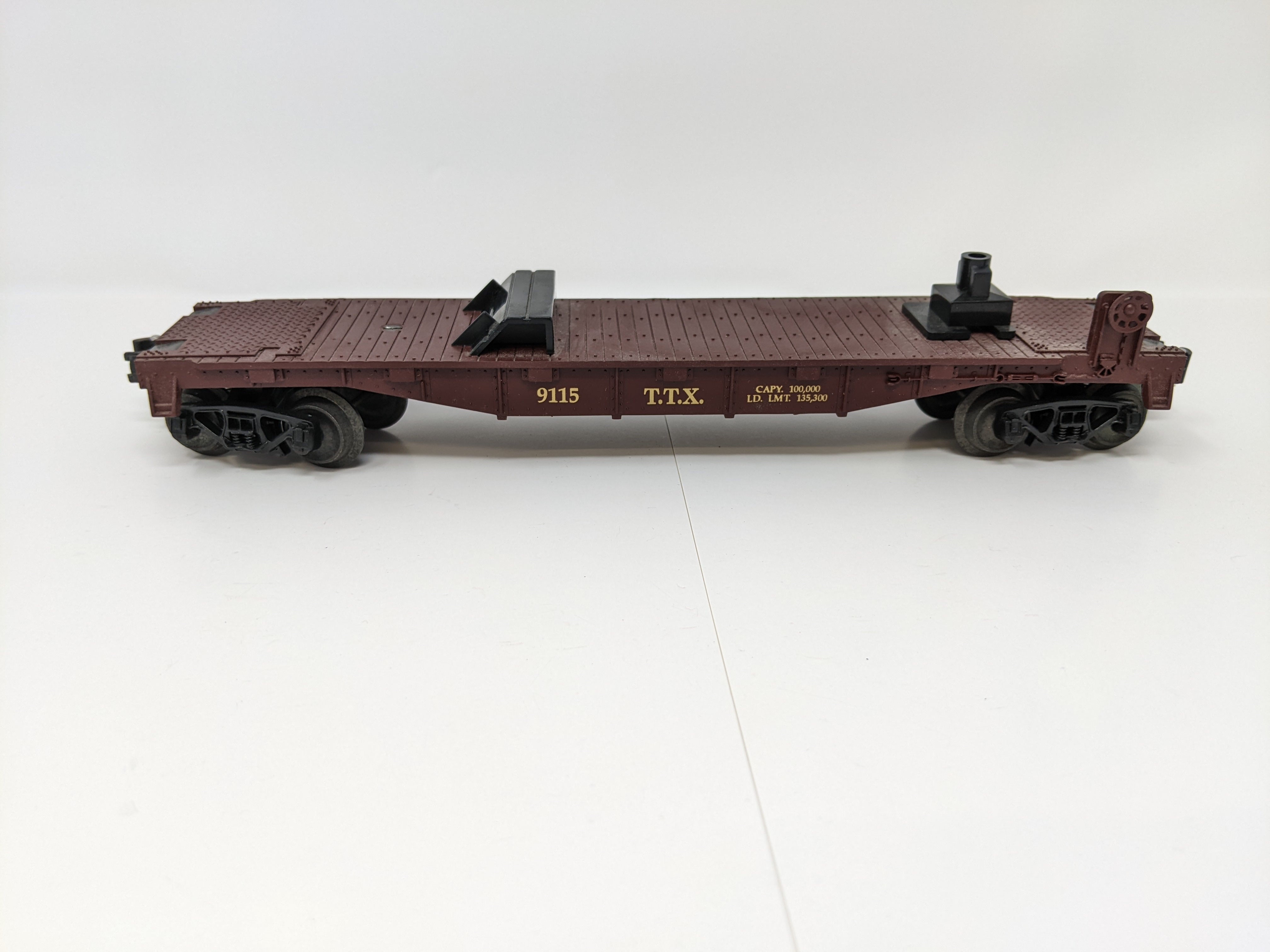 USED Yatming O, Flat Car with Trailer, Pennsylvania TTX #9115, TrucTrain