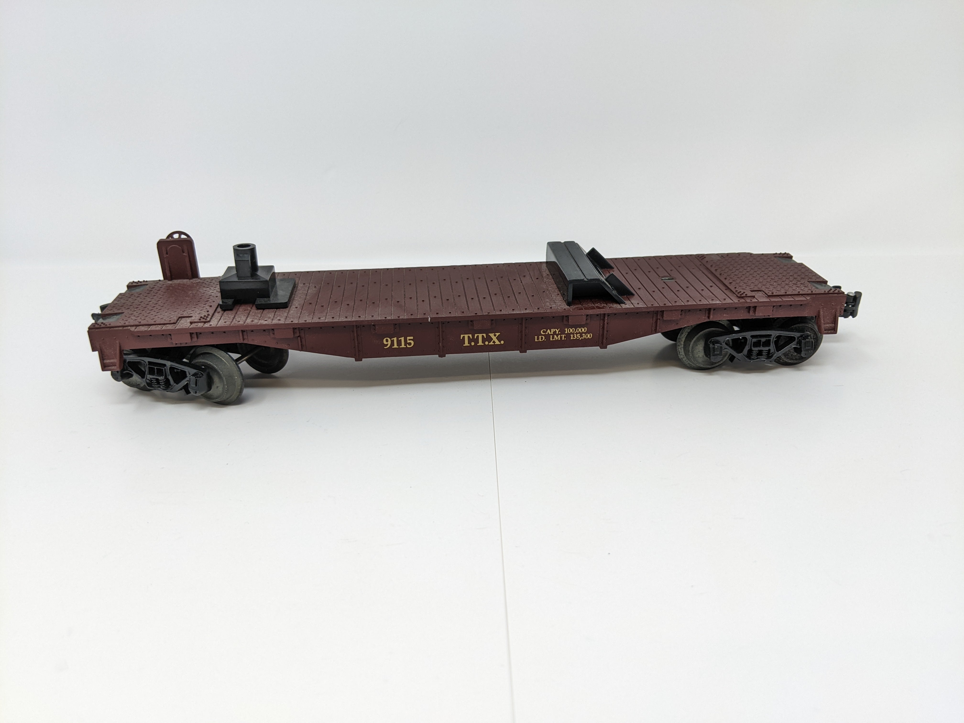 USED Yatming O, Flat Car with Trailer, Pennsylvania TTX #9115, TrucTrain