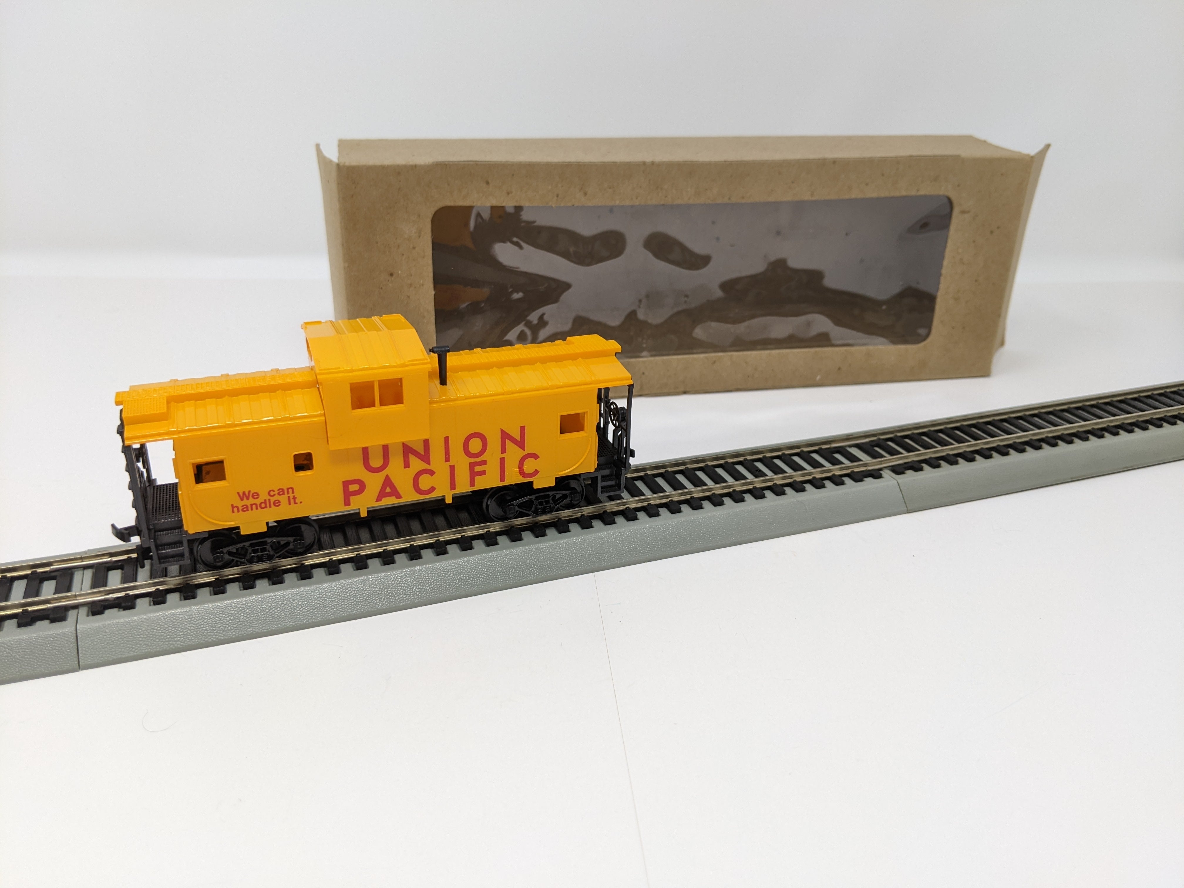 USED AHM HO Scale, Caboose, Union Pacific , "We Can Handle It"