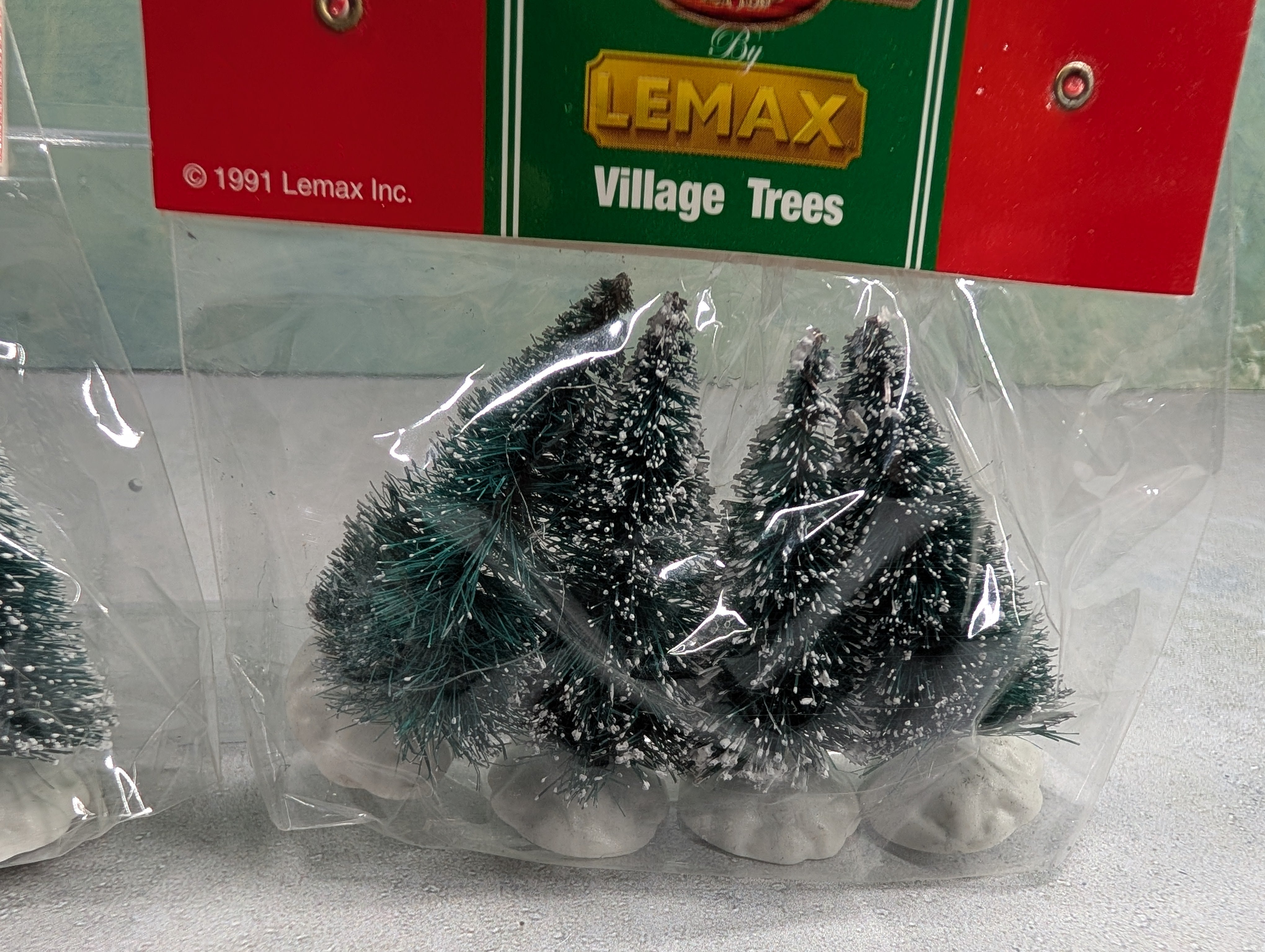 USED Lemax Multi Scale Snowy Trees (8 pcs)