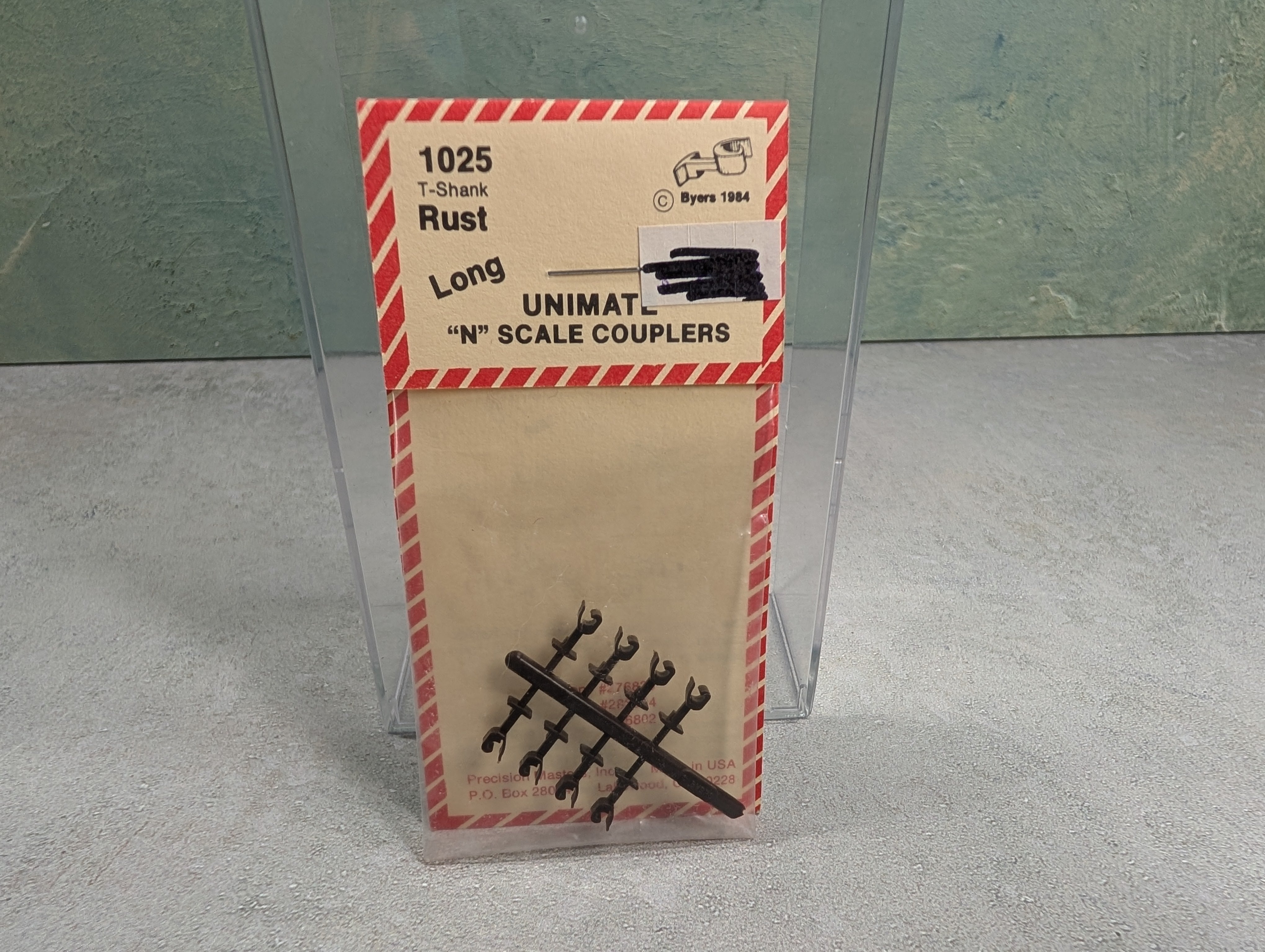 Precision Masters 1025 N Scale T-Shank Long Unimate Couplers Rust Color (8 pcs)