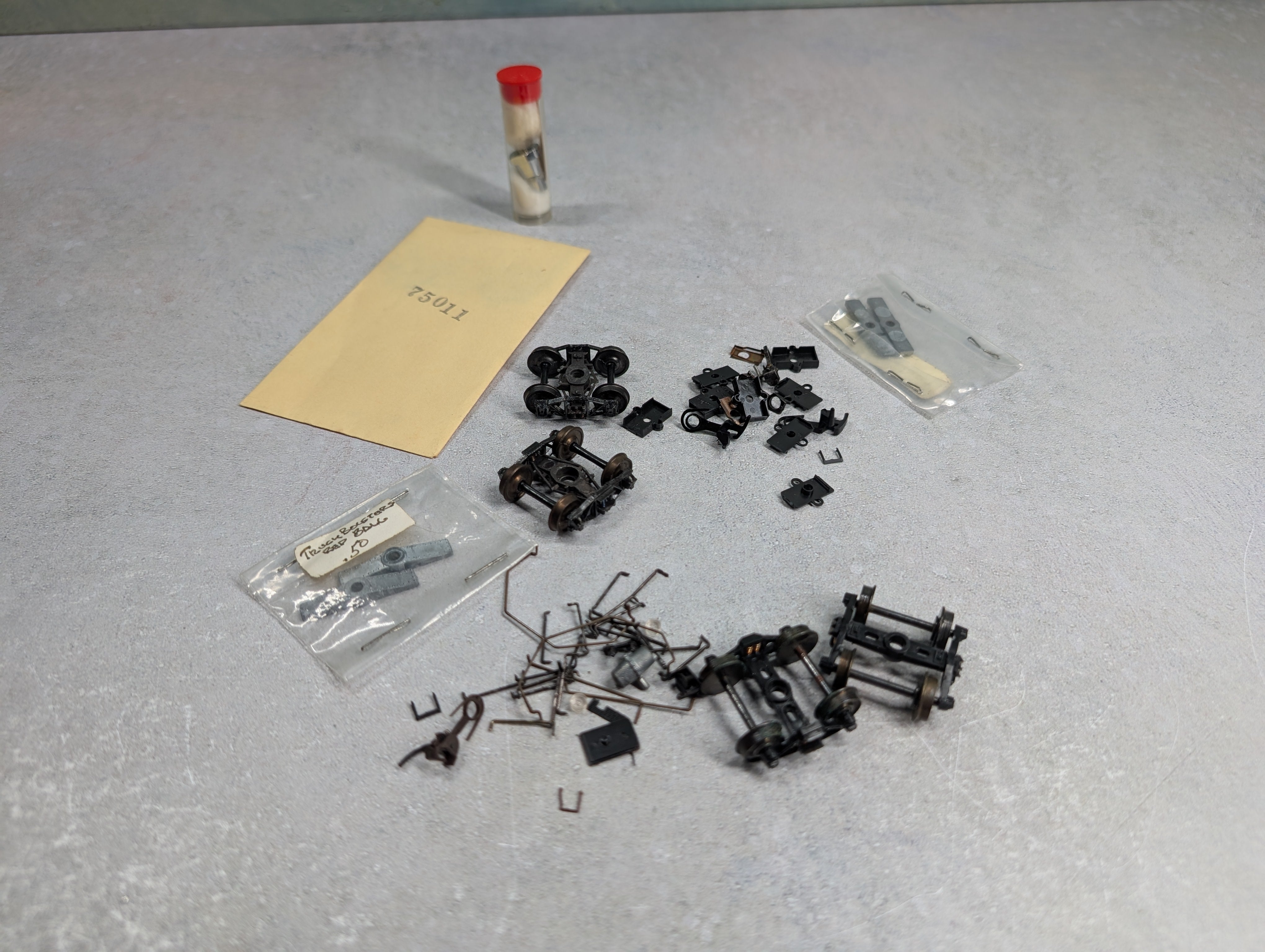 USED HO Scale Lot of Couplers, Trucks, and Parts