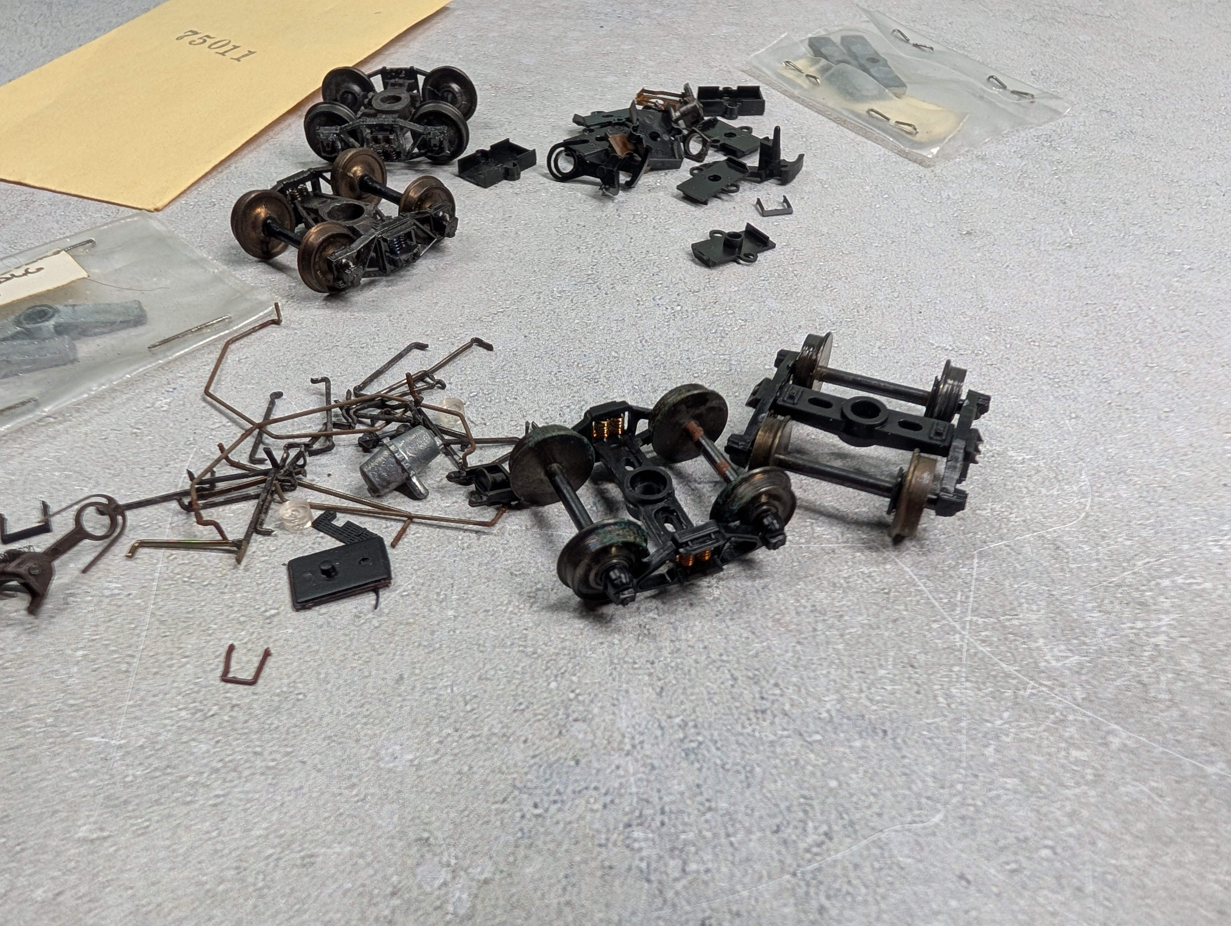 USED HO Scale Lot of Couplers, Trucks, and Parts