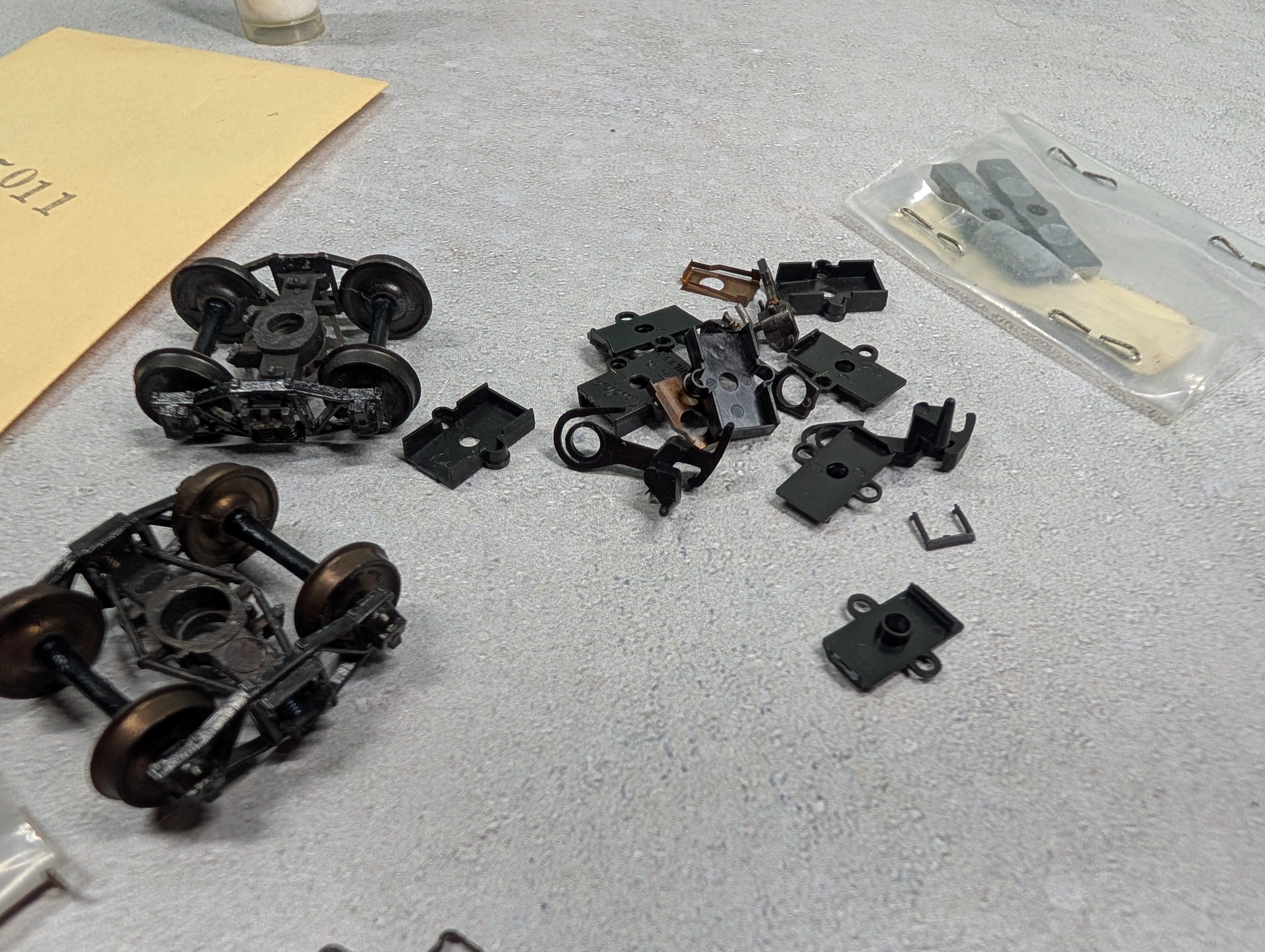 USED HO Scale Lot of Couplers, Trucks, and Parts